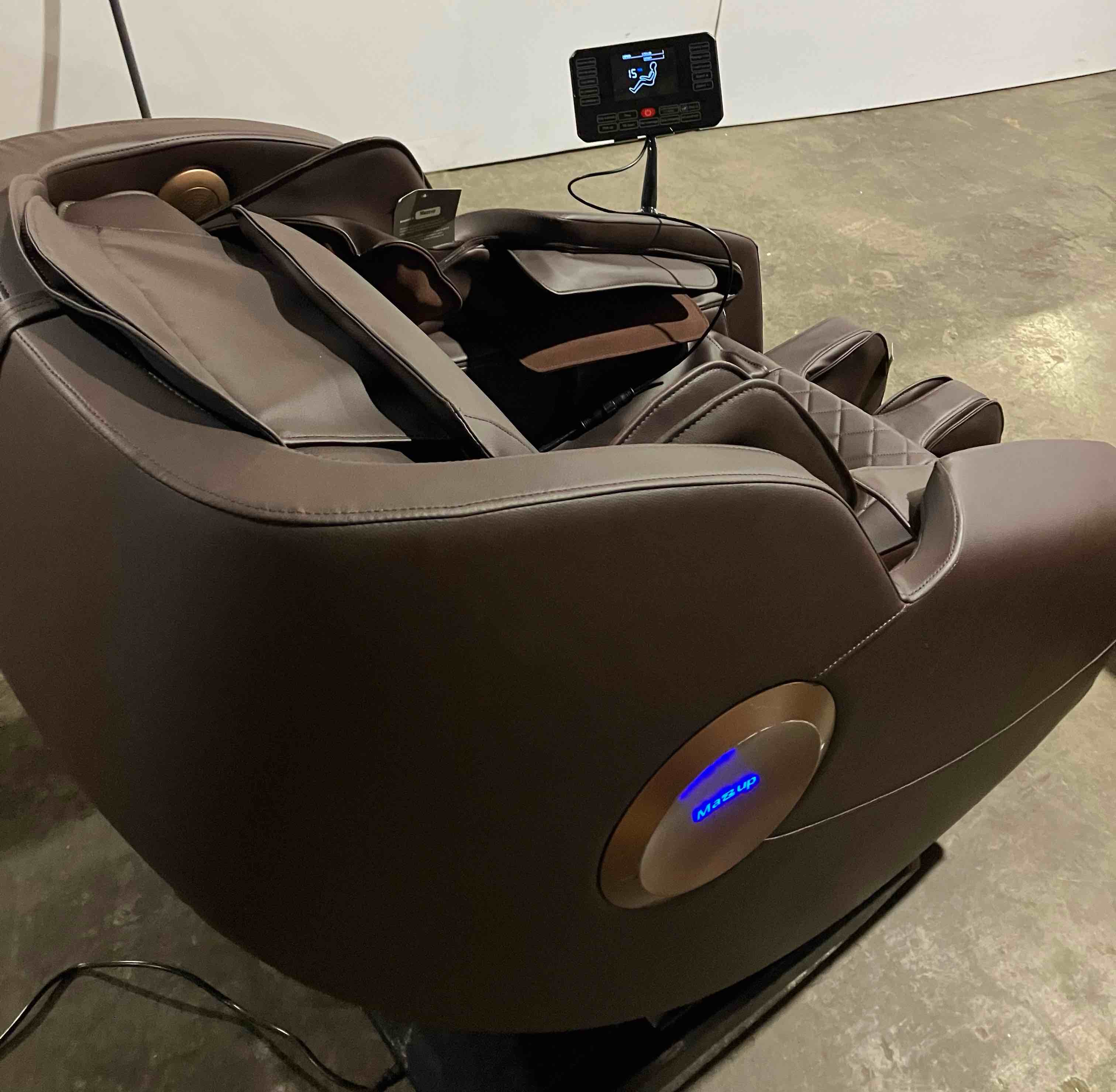 Condition photo showing Good Condition for Massage Chair, Zero Gravity Full Body Massage Chair, Shiatsu Recliner with 14 Massage Points, Lumbar & Calf Heating, 20 Auto Modes, Spacious Massage Area, Bluetooth Speaker, Touch Screen Controller Brown - (Good condition because of small tears on back of chair, pictured. Chair works perfectly)