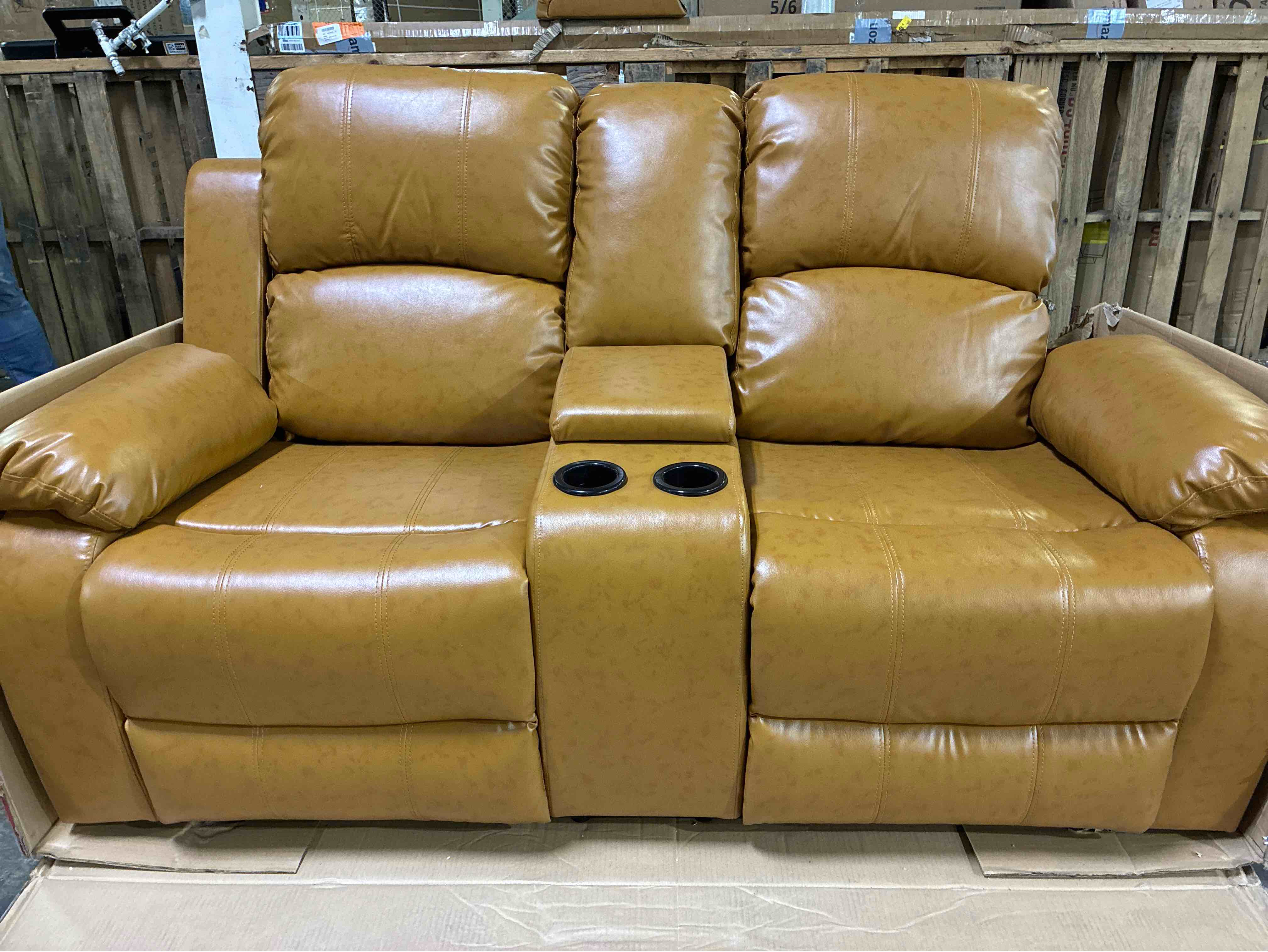 Condition photo showing Good Condition for Ginger Vegan Leather Manual Recliner  Loveseat with Center Console and Cup Holders, Right wing needs replaced can be purchased through Ocstta manufacturer, otherwise brand new condition. 74.5 X 37 X 40