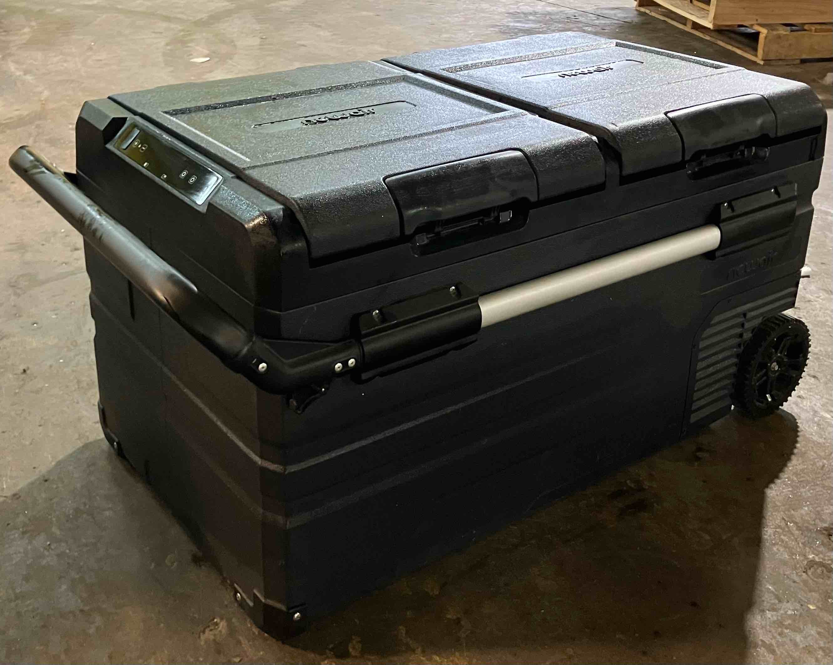 Condition photo showing As Is for NEWAIR® PORTABLE ELECTRIC CAMPING COOLER, 80-QUART, 12V/24V DC - (As is because power cord is not included, so working condition could not be verified. Replacement cord can be purchased thru Amazon)