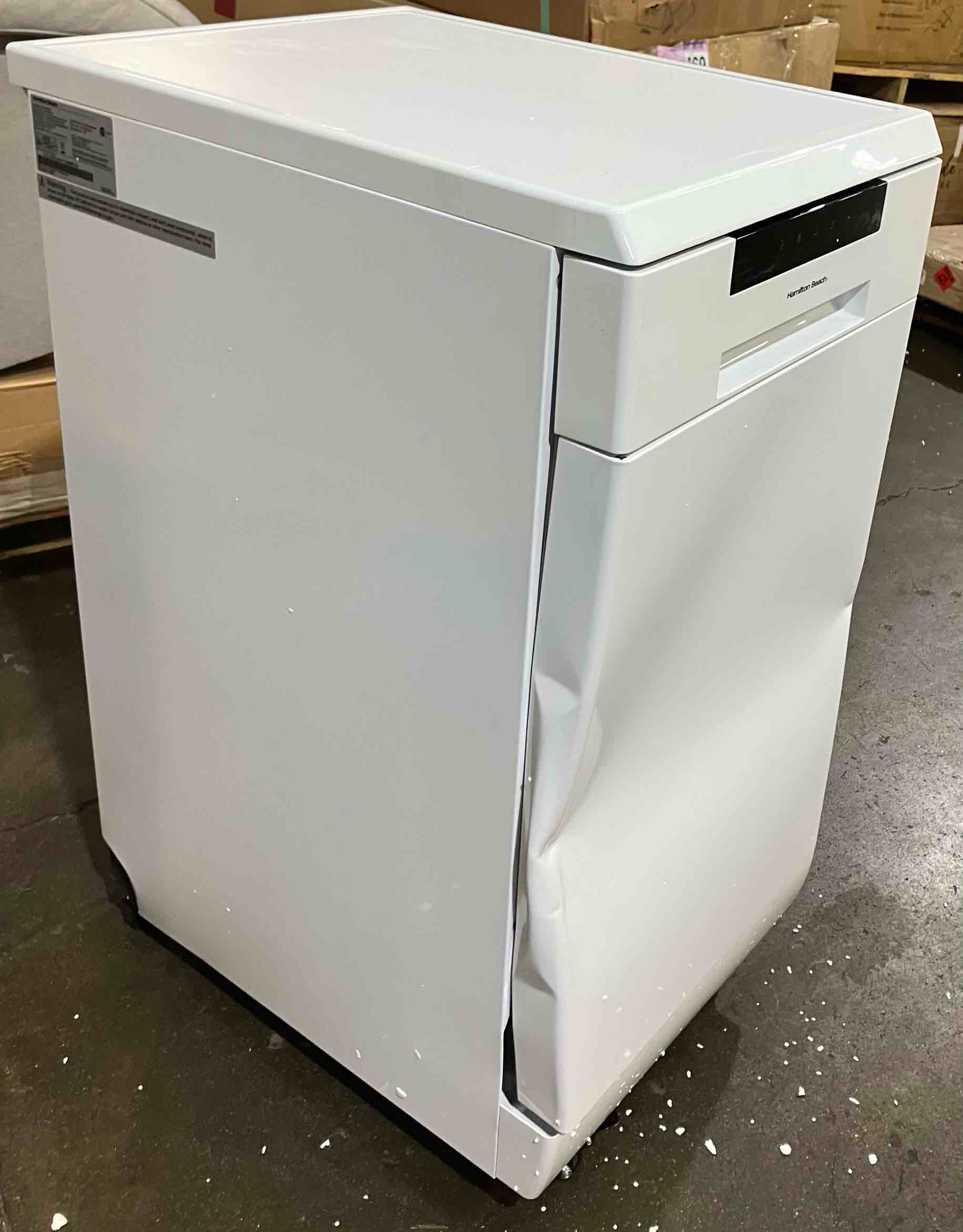 Condition photo showing As Is for Hamilton Beach 18  Portable Dishwasher in White - (As is because of several dents and dings, pictured, and has 1 wheel broken off that will need replaced)