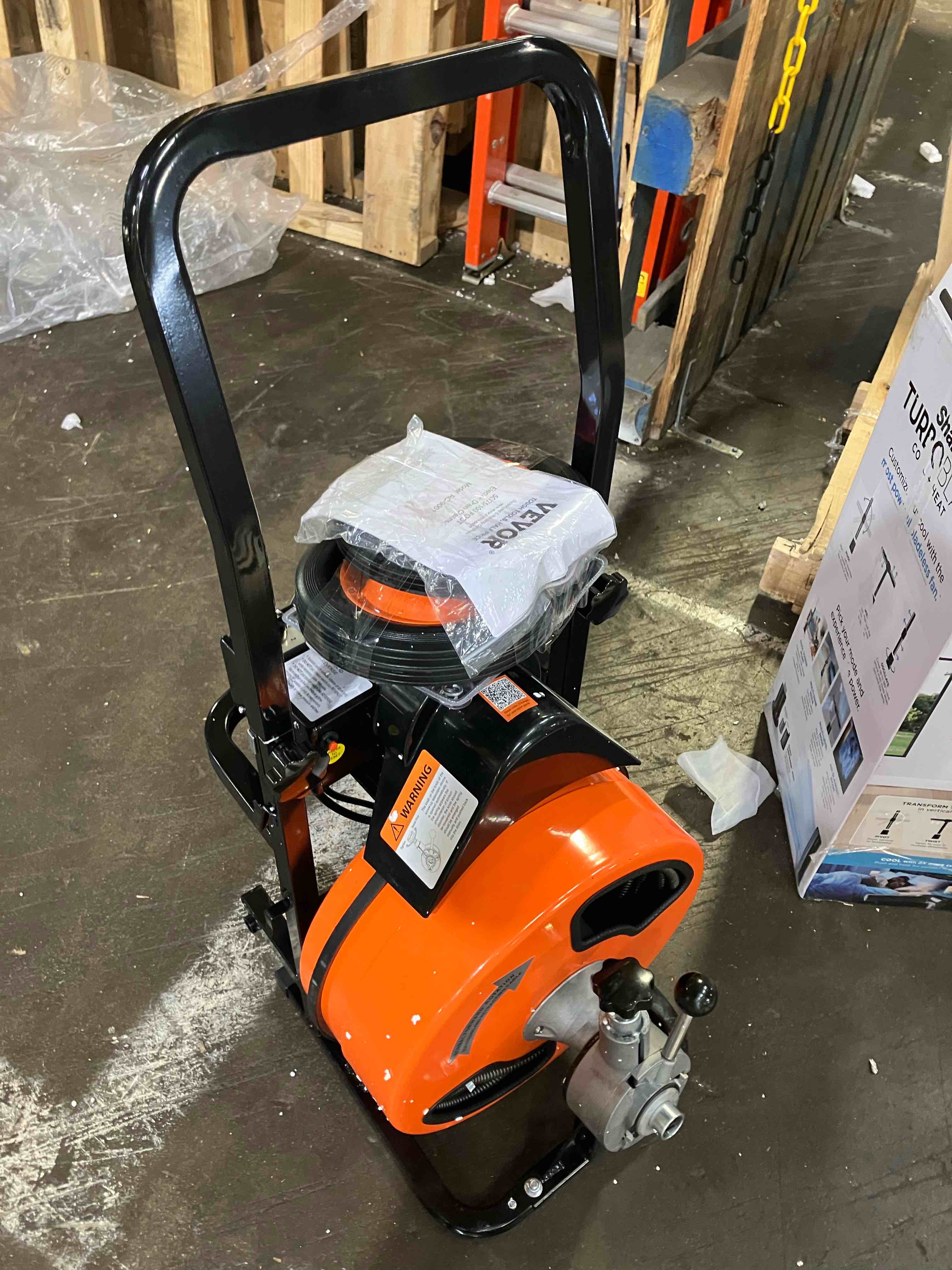 Condition photo showing Good Condition for VEVOR Drain Cleaner Machine 100FT x 1/2Inch, Auto Feed Sewer Snake Auger with 4 Cutter & Air-activated Foot Switch for 2" to 4" Pipes, Orange, Black 100ft x 1/2Inch Orange, Black - (Good condition because item is missing bar that connects wheels, so item will have to be used wheelless or buy aftermarket bar)