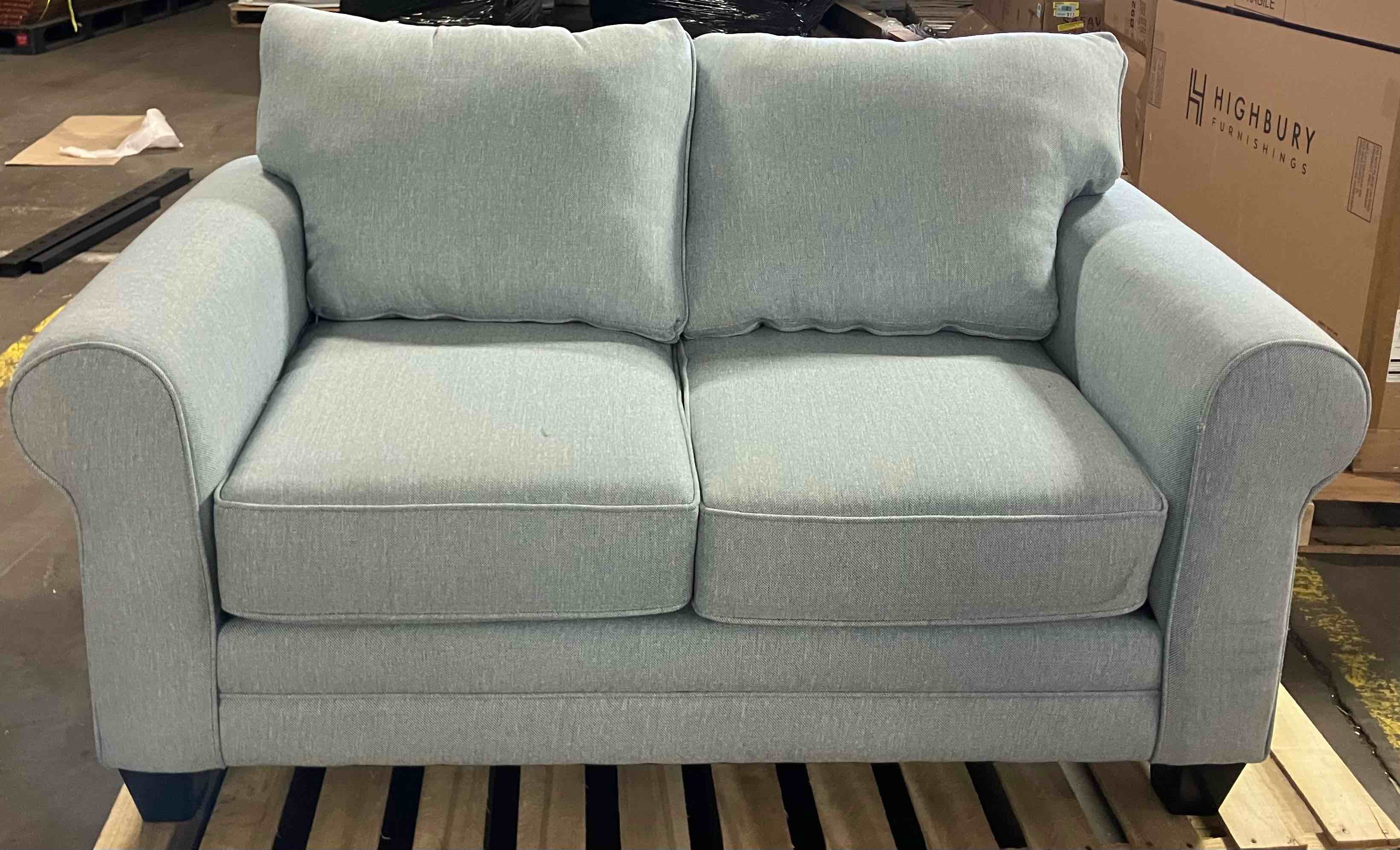 Condition photo showing New/Like New for Desousa 65" Rolled Arm Loveseat with Reversible Cushion By Dovecove - (Item is New/Like New, but does have a small stitching flaw on right arm edge, pictured)