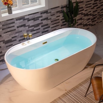 Condition photo showing As Is for woodbridge b0059 35.38-in x 72-in white with brushed gold trim acrylic oval freestanding bathtub, as is because one side of bathtub shell is cracked (pictured) tub can be resealed