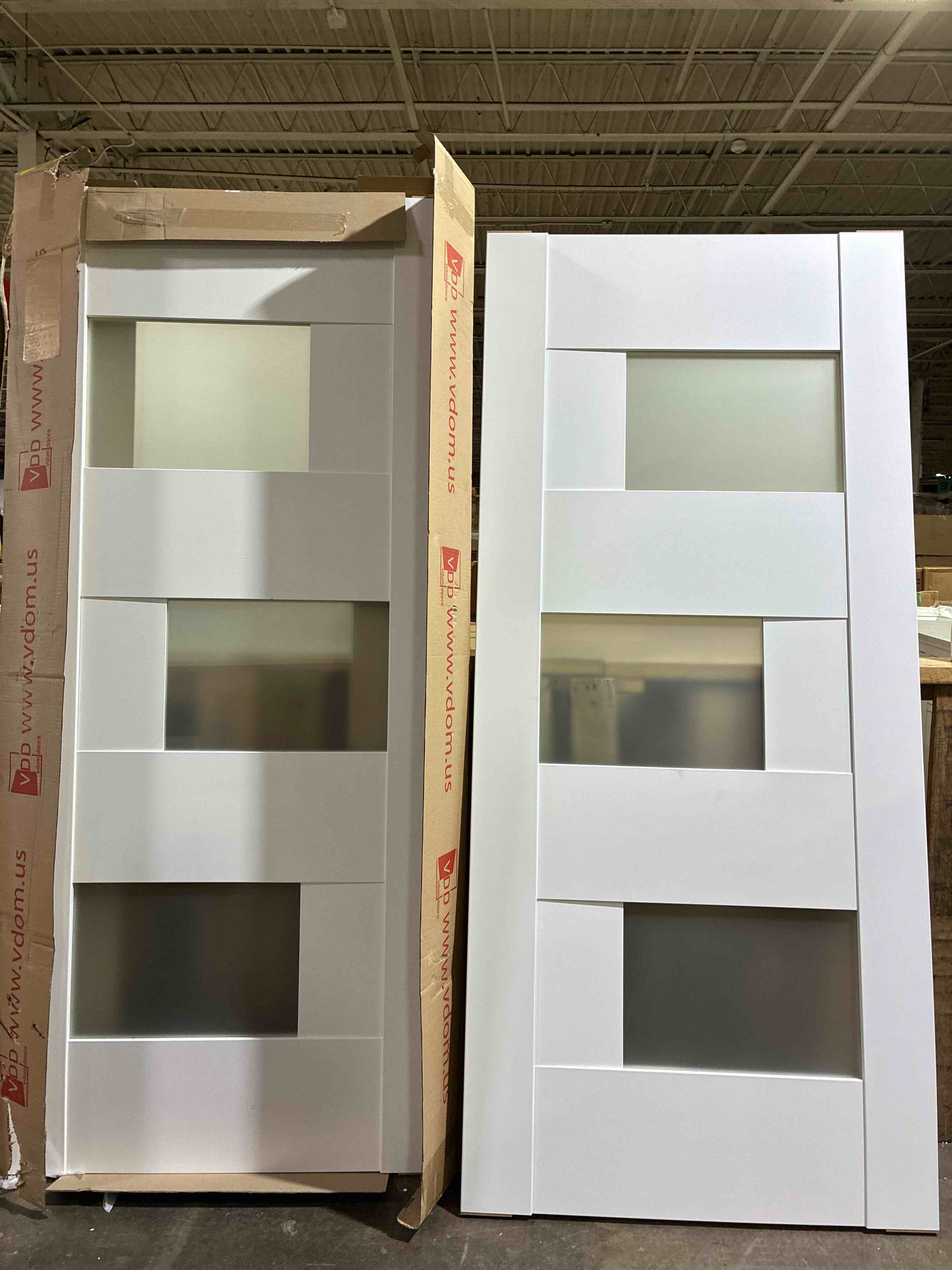 Condition photo showing New/Like New for vdomdoors white, modern double swing interior french doors with frosted glass panels, mdf, 72” w x 80” h x 3” thick. not predrilled. handles, hinges, and holes not installed slabs are brand new.  