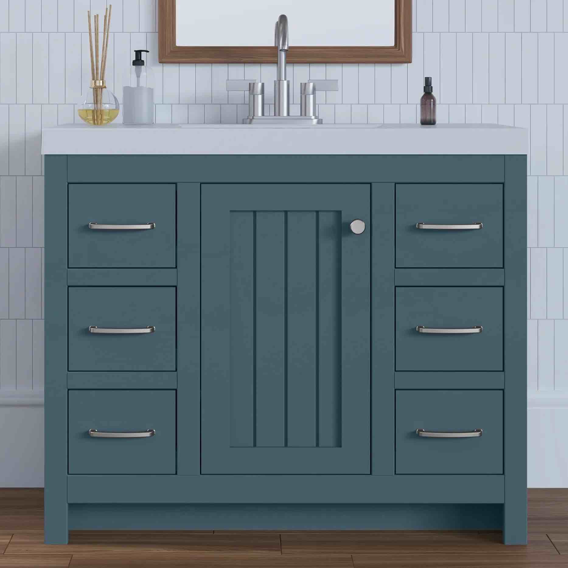 42.5" Cadet Blue Single Bathroom Sink Vanity With 6 Drawers, 1 Open Space Cabinet, Chrome Handles and Knobs, and Cultured Marble Top. Minor scratch along right side, knob for cabinet needs replaced, otherwise quality vanity. 36.24'' H X 42.5'' W X 18.75'' D
