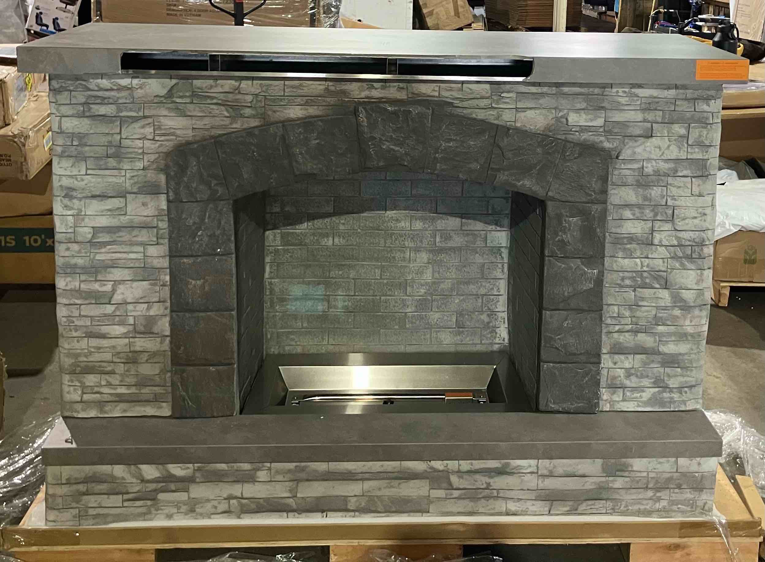 Condition photo showing Good Condition for prokan 67 in. european ledge outdoor propane fireplace - (good condition because front ledge is broken, pictured, and there are small scratches on top)
