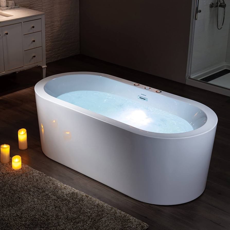 woodbridge 66-1/2" x 31-7/8" whirlpool water jetted and air bubble freestanding heated soaking combination bathtub with chrome hardware, 66.5 in actual length 31.88 in actual width 31.75 in actual height