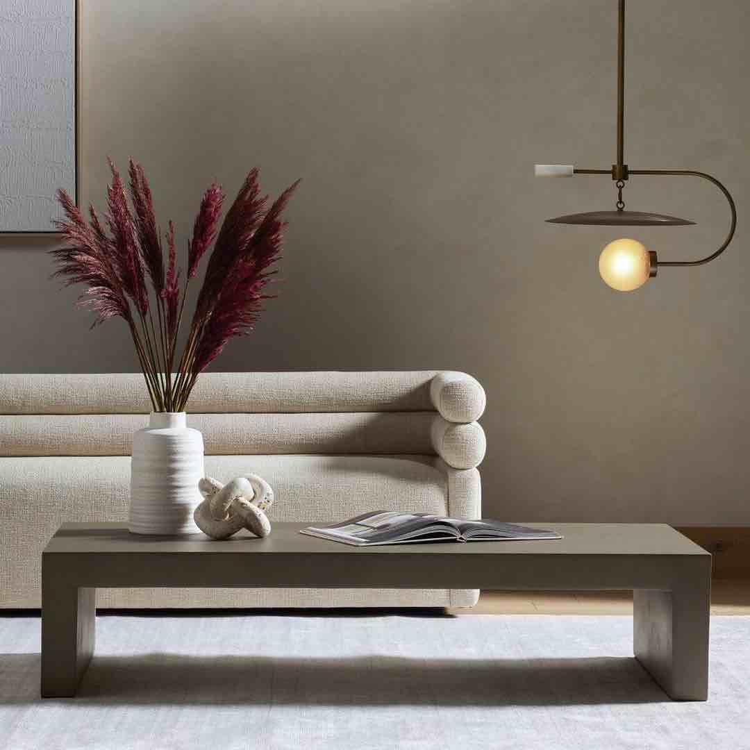 Parish Coffee Table In Gray Concrete, Made For Indoor Or Outdoor Spaces. Cover Or Store Indoors During Inclement Weather And When Not In Use. Overall Dimensions 60”W x 30”D x 13”H, Small 1” Chip On Right Side(Pictured), 3”-4” Cosmetic Hairline Crack Along Top Right Side of Table, Does Not Go Through The Table.(Pictured), Small Chippings Along Bottom Edges, One Small Chip On Front Right Top Corner. 