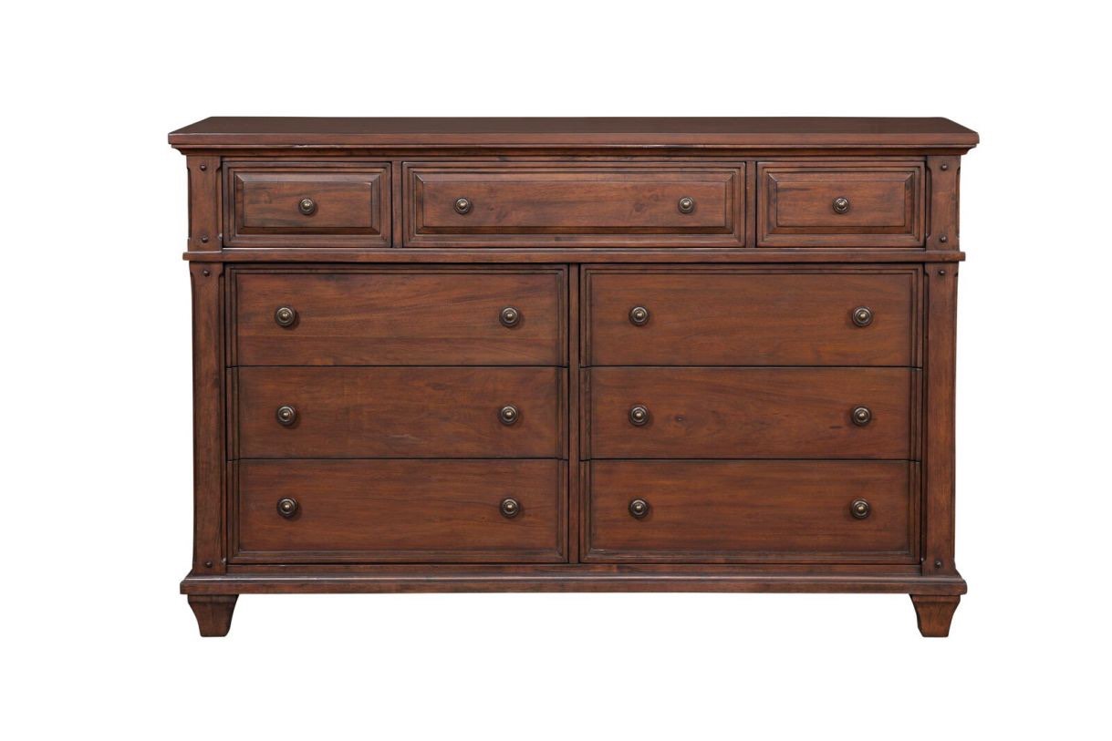 American Woodcrafters Cinnamon Cherry Sedona 7-Drawer Dresser with Bronze Painted Wooden Knobs. Some scuffing along edges and top, Top left drawer knob needs replaced, hole in backboard does not effect function, drawers in beautiful condition, Height (bottom to top): 42.00 Width (side to side): 66.00 Depth (front to back): 19.00 Weight: 156.00