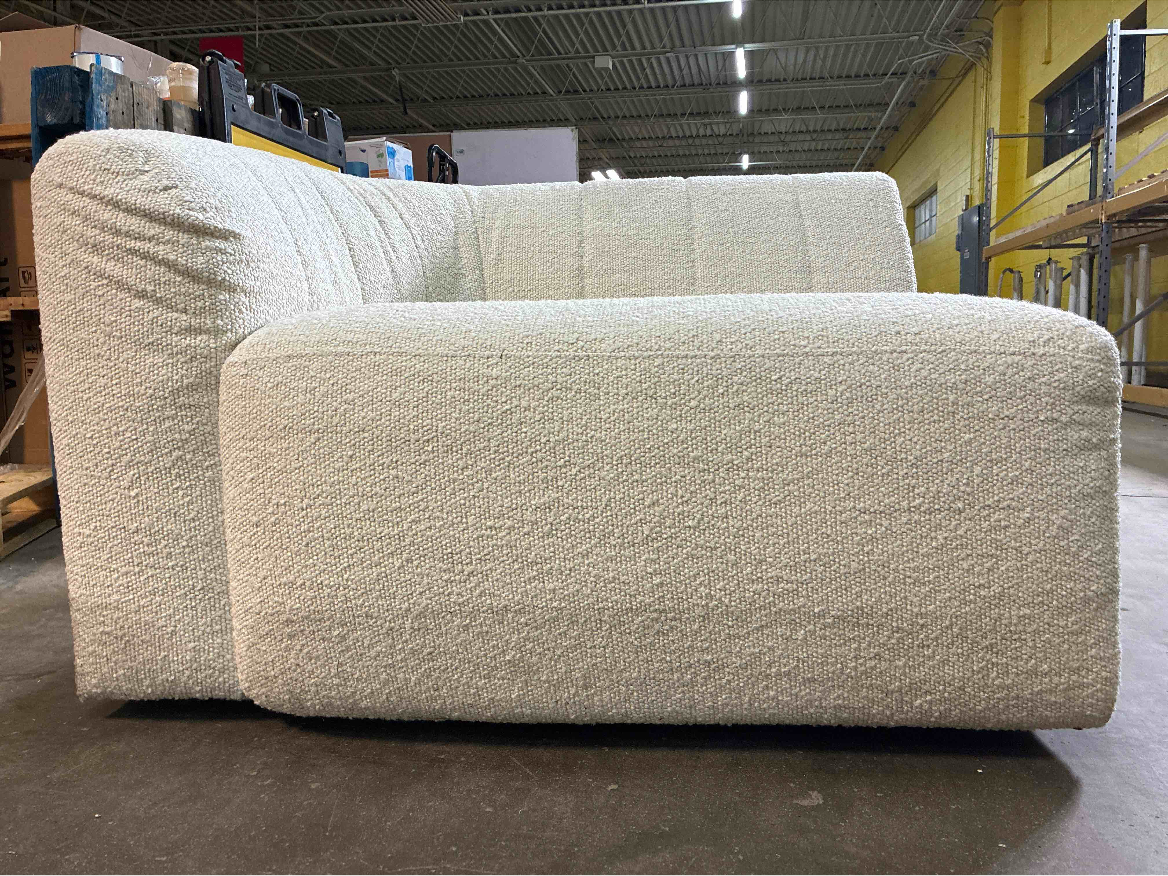 Condition photo showing Good Condition for bowry white line tufted chenille corner chair in fayette cloud white. needs some deep cleaning on side, otherwise brand new. 43” w x 28” l