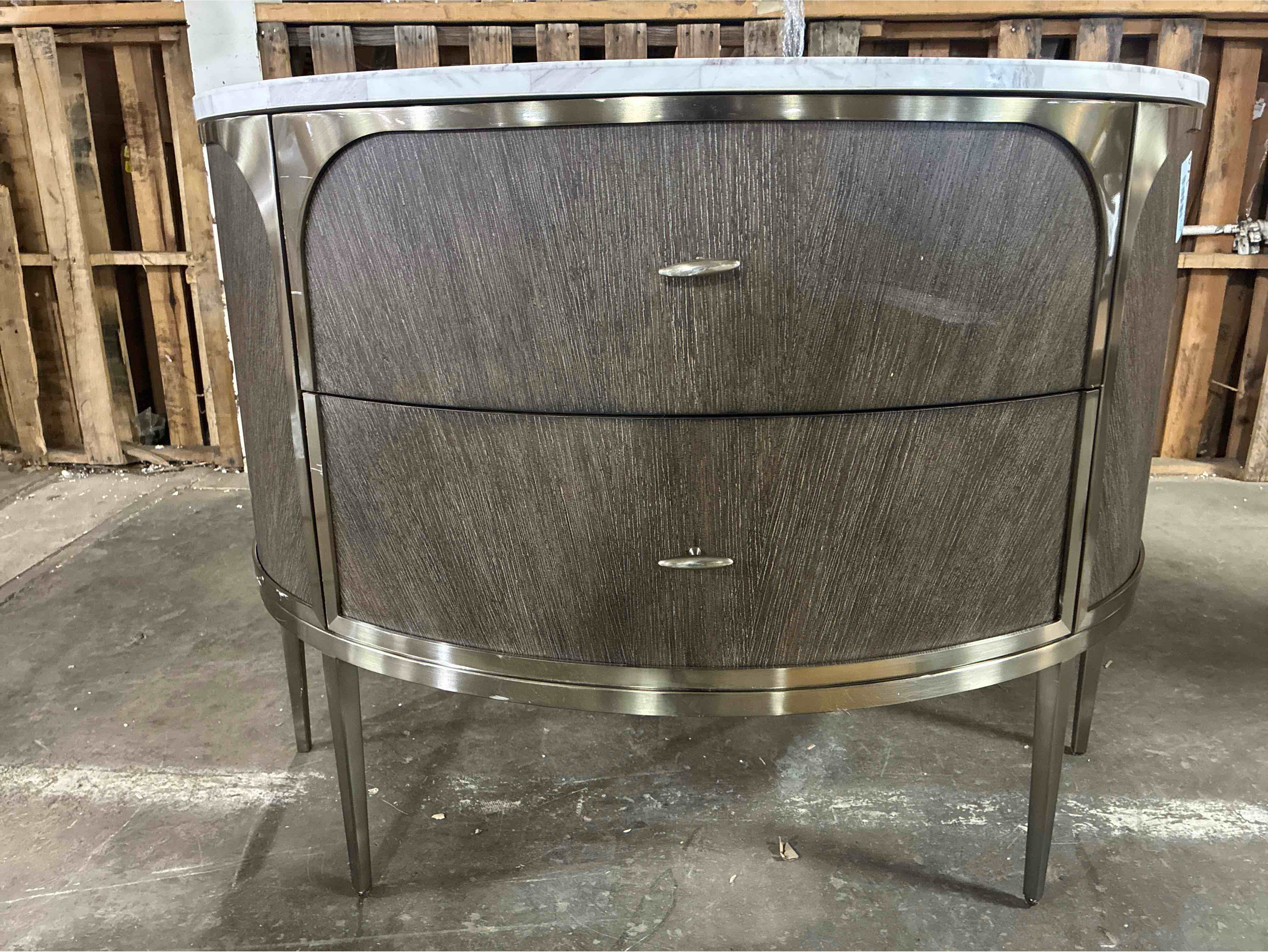 Condition photo showing Good Condition for modern mood dark wood grain two drawer nightstand with white marble top, nickel brushed frame, legs, and handles. some scratching along metal frame and back, otherwise beautiful condition. 32'' h x 42'' w x 16'' d