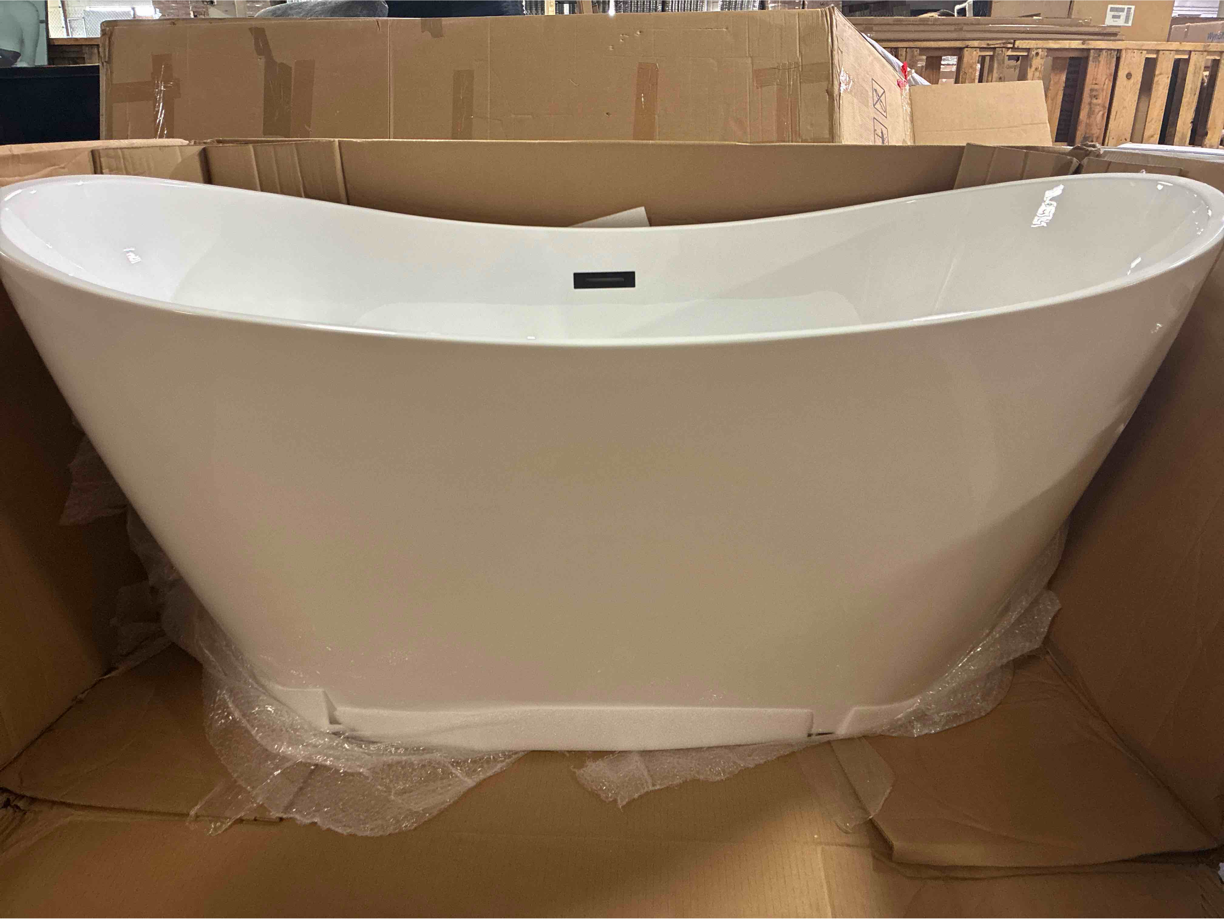 Condition photo showing New/Like New for woodbridge 59"freestanding white acylic soaking bathtub with matte black drain and overflow, 59"l x 28.75"w x 27.5"h