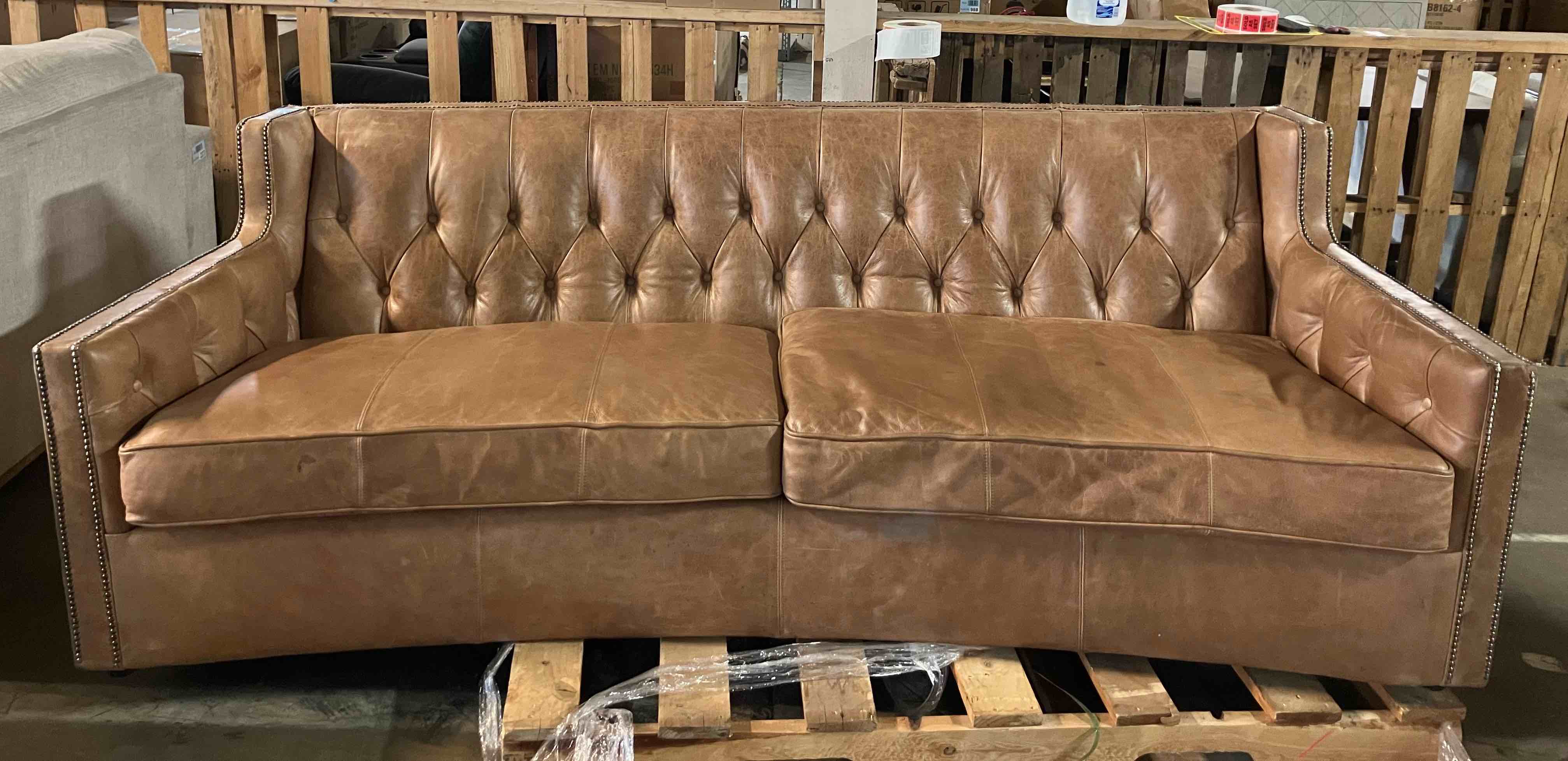 Condition photo showing Good Condition for candace 96" genuine leather square arm sofa - (good condition because of scuffs on some of the corners and edges, pictured, and one cushion has a broken zipper that needs repaired)
