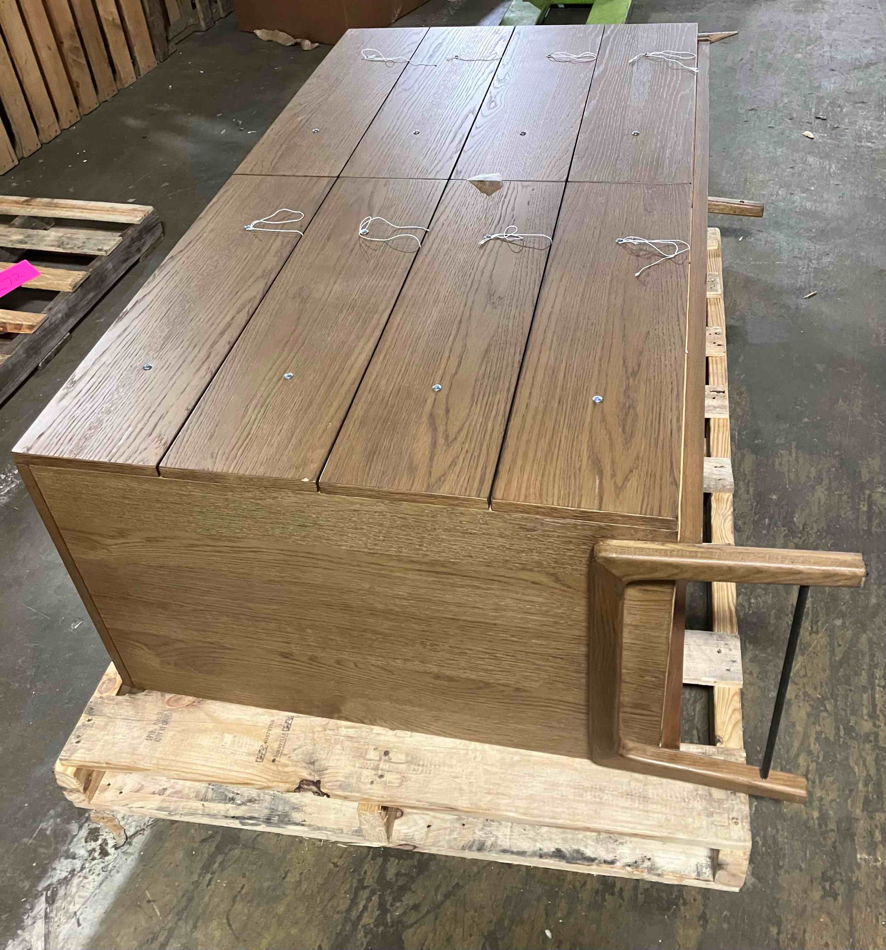 Condition photo showing As Is for rosedale 8 drawer dresser, amber oak by four hands - (as is because a leg is broken, pictured. also small scuffs and scrapes on some corners)