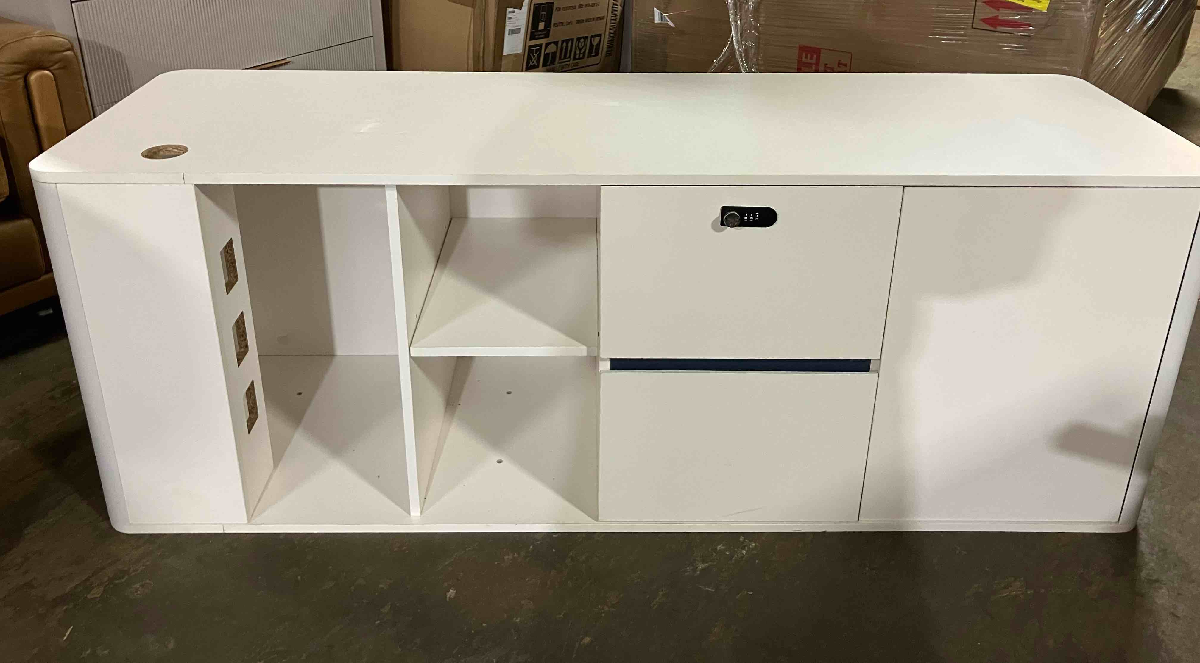 Condition photo showing Good Condition for 63" modern white tv stand w/ storage, locking drawer & power access - media console cabinet - drawer code 0000 - (good condition because of a deep scrape on the left side, pictured, and a few scuffs and marks on drawers and edges)