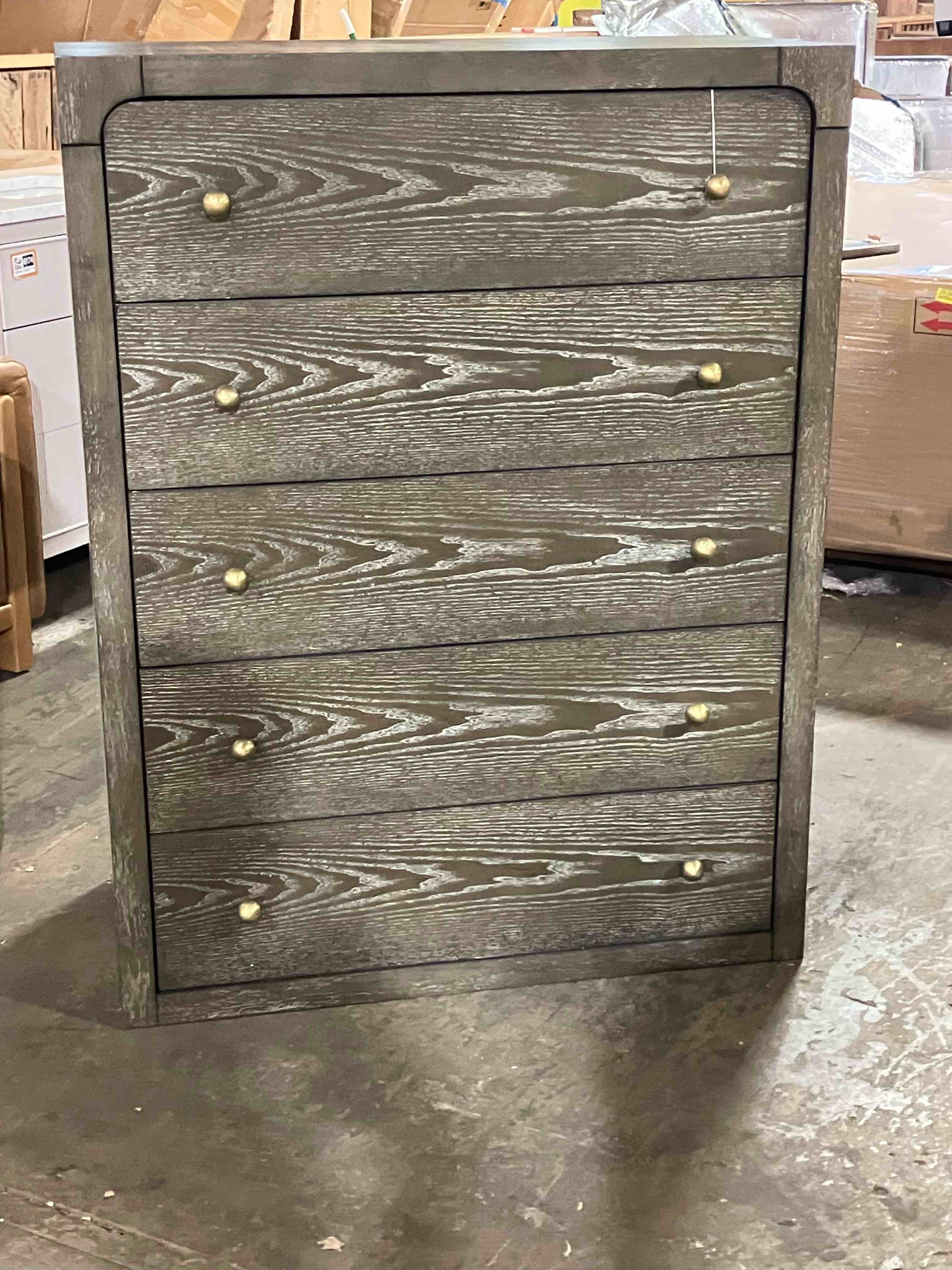 Condition photo showing Good Condition for czupka 5-drawer bedroom chest of drawers dark cocoa - (good condition because it is missing the base/feet to the dresser, but is not noticeable and doesn’t affect the function. dresser also has a few scuffs on the corners and one on top, pictured)