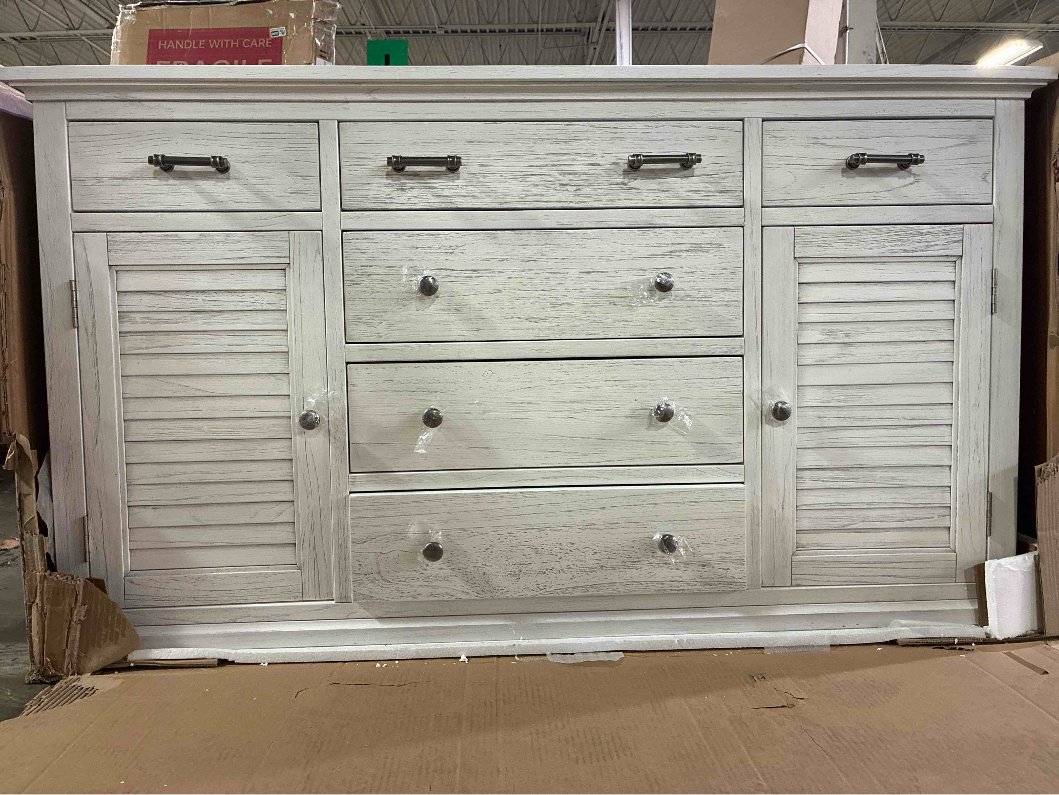Condition photo showing Good Condition for surfside distressed white 6-drawer 2 cabinet dresser with brushed nickel handles and knobs. some chipping on back top edge, otherwise beautiful condition. 36"h x 58"w x 18"d