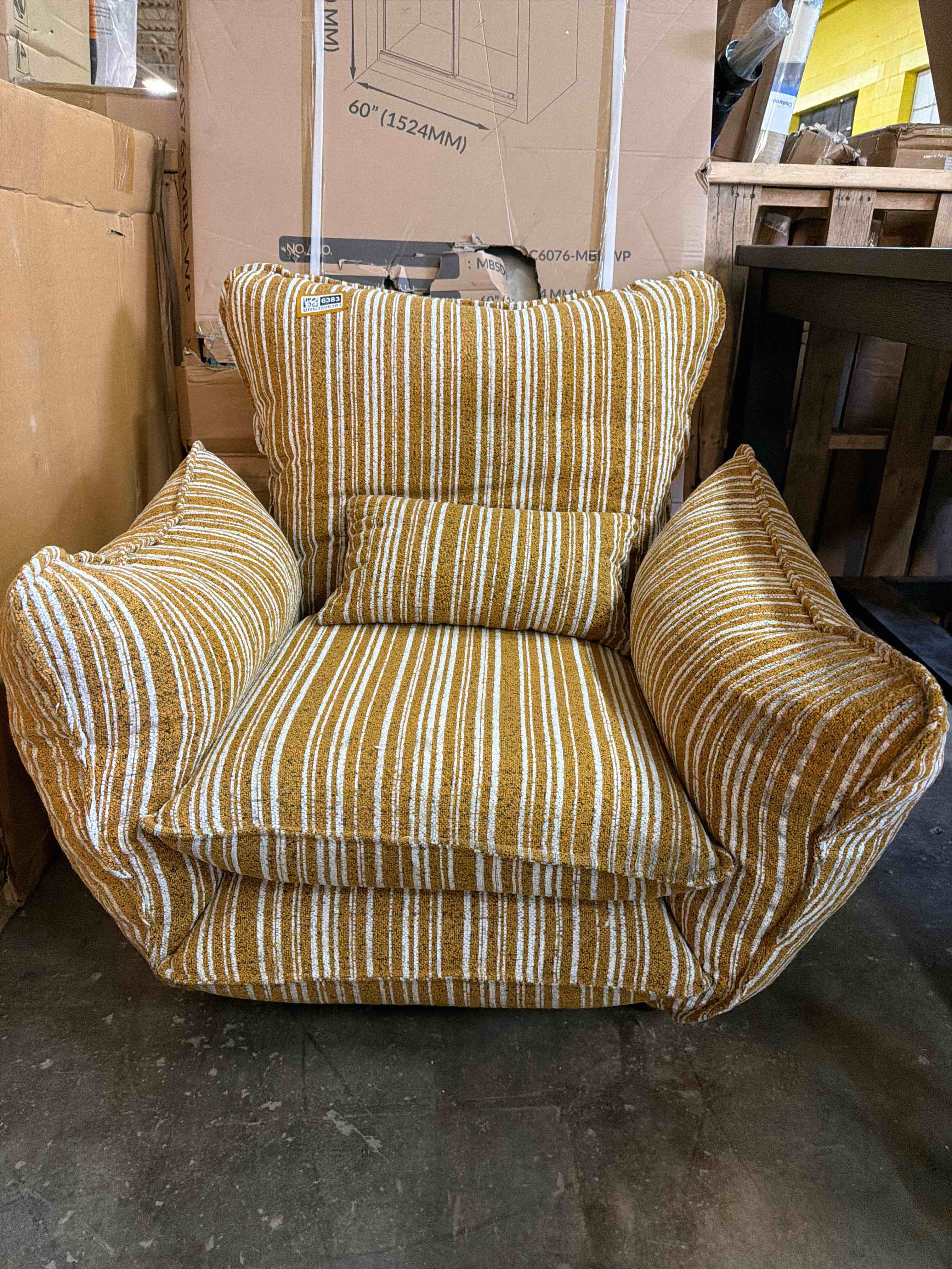 Condition photo showing Good Condition for yellow chenille accent chair with lumbar pillow, chair needs light cleaning, 32'' h x 24'' w x 27'' d, right arm and front right side of seat has slight black marks(pictured) 