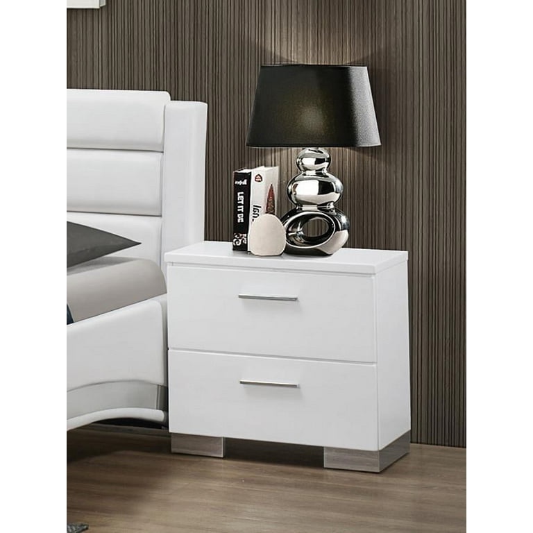 Coaster Home Furnishings Glossy White 2 Drawer Night Stand with Nickel Brushed Handles and Feet. Minor chipping on right front side corner, top drawer needs track fixed to open fully. 23.25" W x 15.25" D x 22.75" H