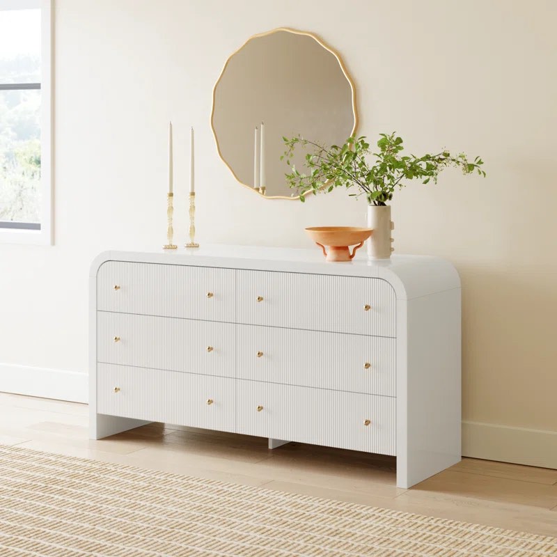 Liabella 62'' W White Modern 6 - Drawer Dresser with Shiny Gold Knobs and Fluted Drawer Doors. Stabilizer piece needs replaced, edges have some chipping. 34'' H X 62'' W X 20'' D