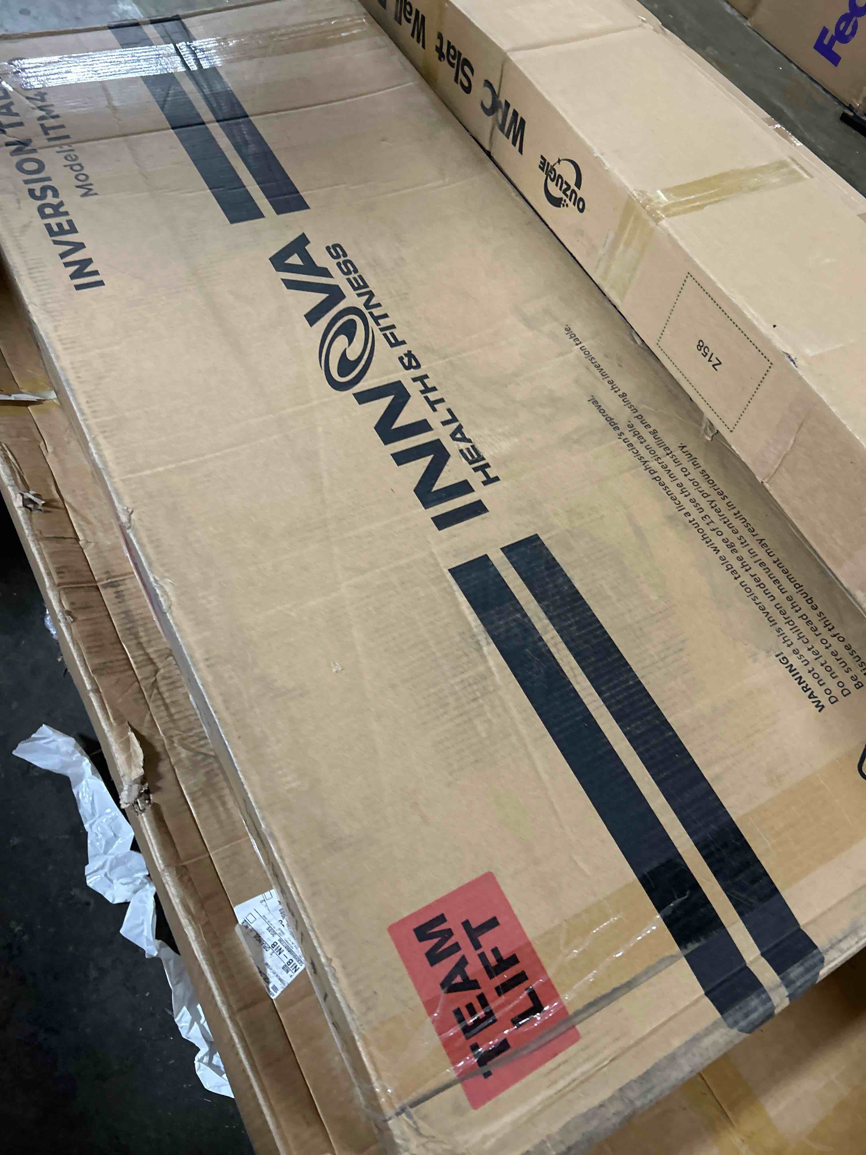 Condition photo showing New/Like New for INNOVA HEALTH AND FITNESS ITM4800 Advanced Heat and Massage Inversion Table,Black/ Blue / Gray