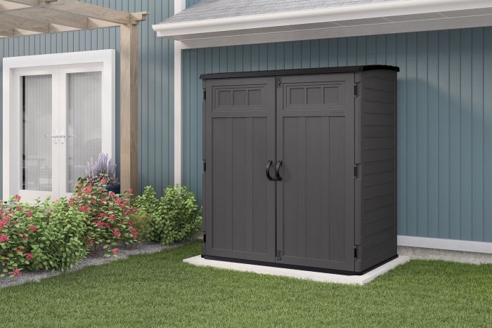 Suncast 106 Cubic Feet Extra Large Vertical Outdoor Resin Storage Shed in Grey. Easy to assemble, locking capabilities, weather resistant. 5’ 10” W x 3’ 8” D x 6’ 5” H