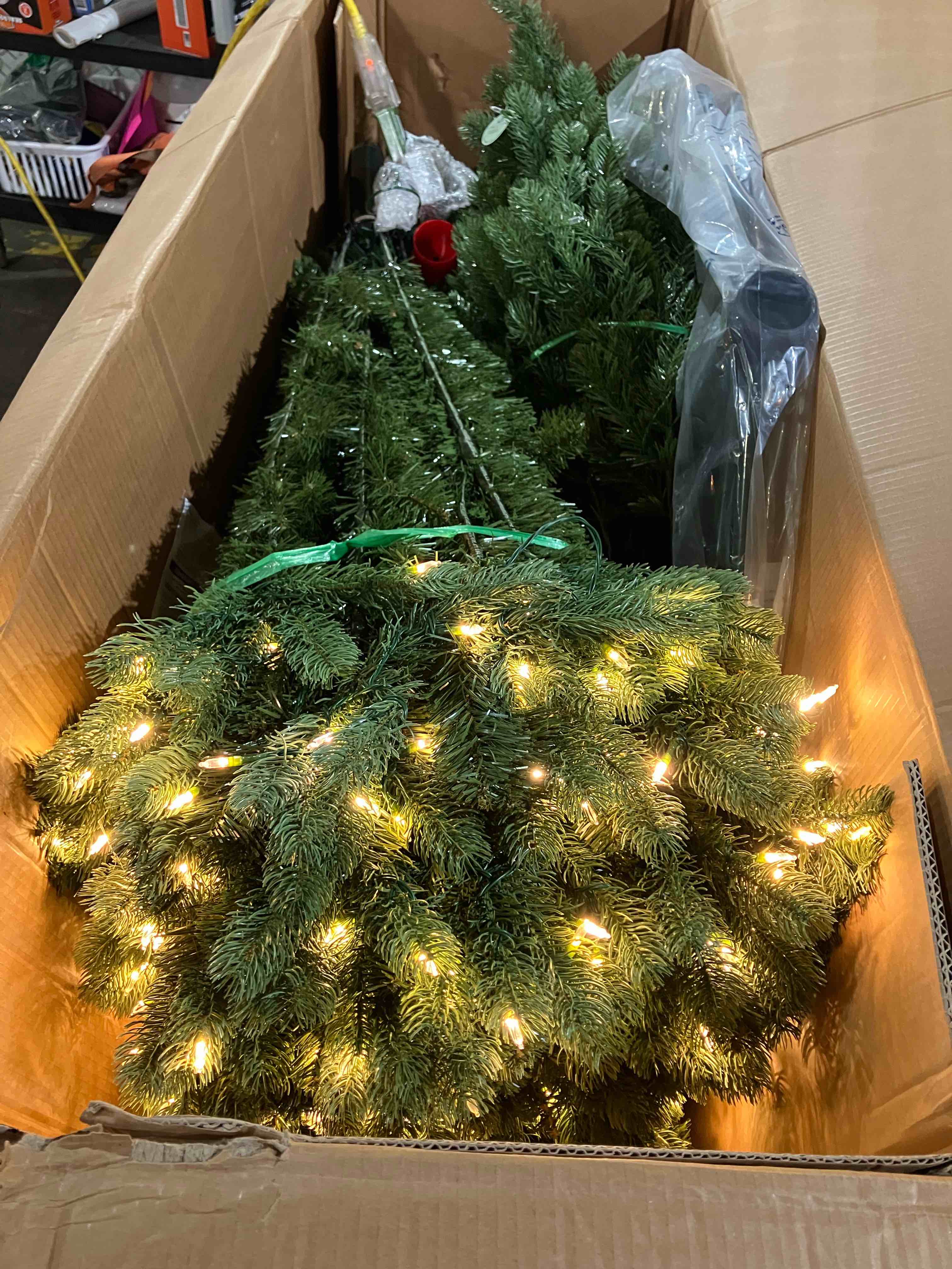 Condition photo showing New/Like New for National Tree Company 9 ft Pre-Lit Downswept Douglas Fir Artificial Christmas Tree, 900 LED Lights, 3,185 Tips, PowerConnect, Foot Pedal, 10 Light Functions, Includes Stand, Green 9ft