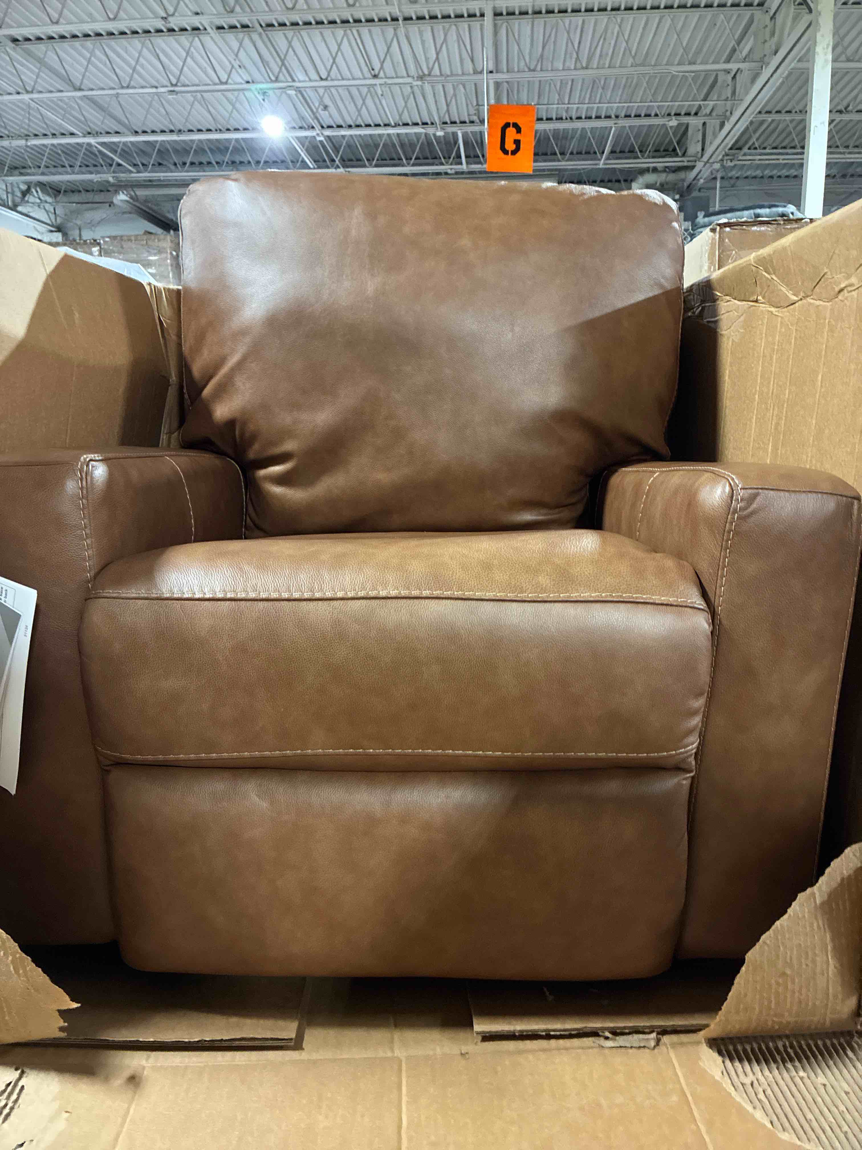 Condition photo showing New/Like New for Signature Design by Ashley Bolsena Caramel Contemporary Leather Manual Rocker Recliner, Set of 2. Width: 35.00" Height: 38.00" Depth: 40.00"