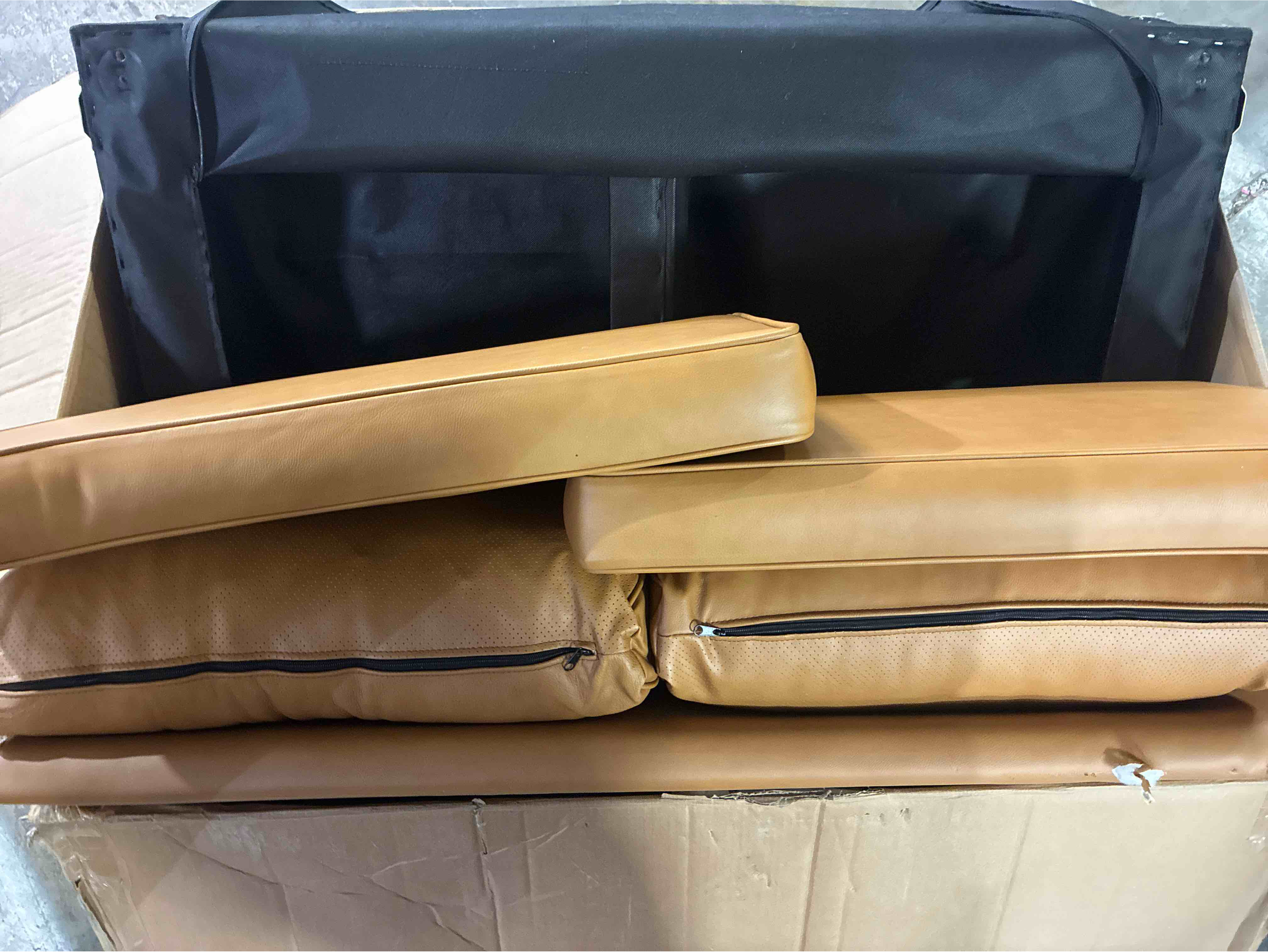 Condition photo showing Good Condition for Impart Tan Genuine Leather 2 Seater Loveseat with Light Rubberwood Legs, minor tear on left back edge can be restitched. 32.5'' H X 54.5'' W X 31.5'' D