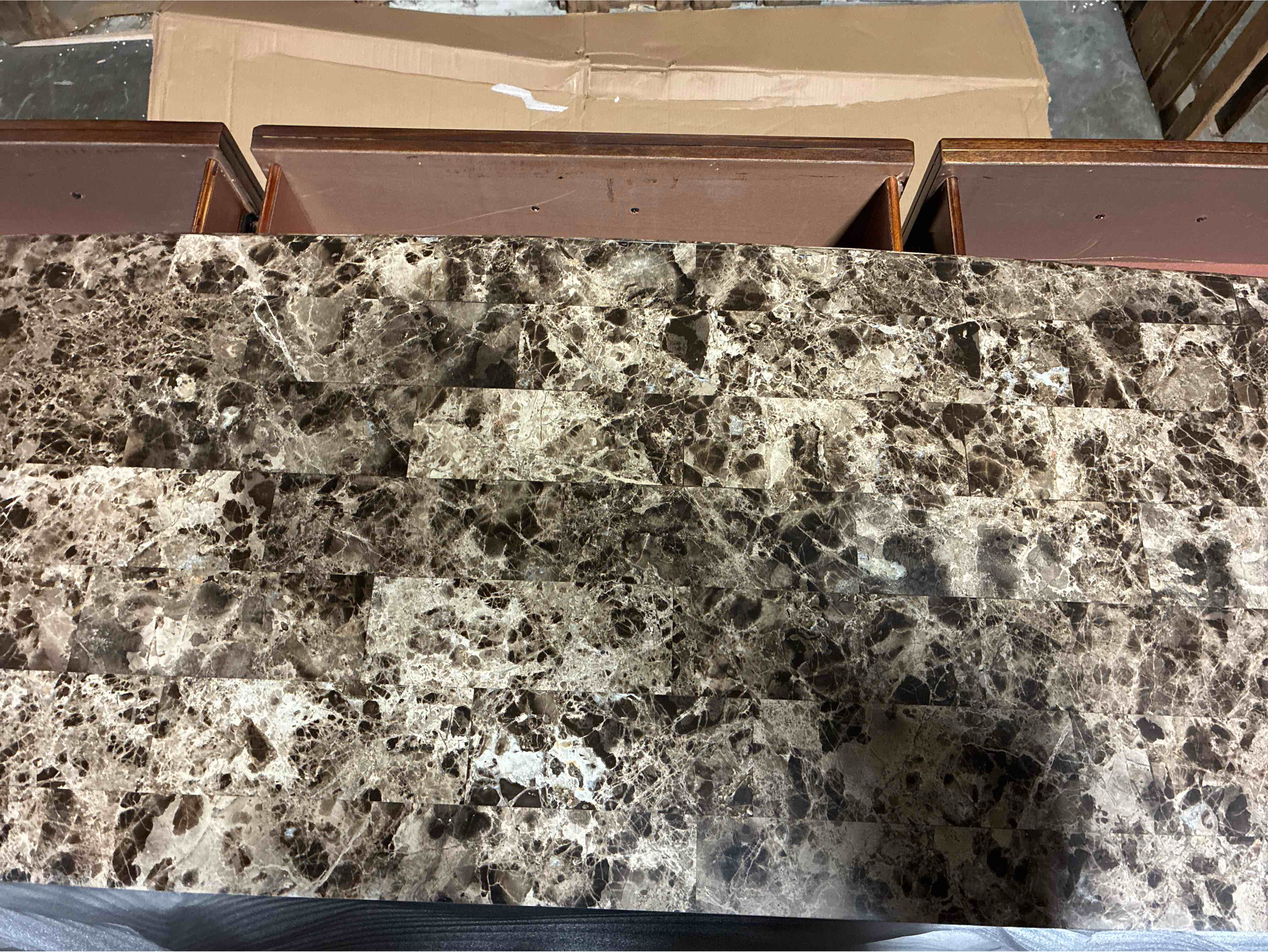 Condition photo showing New/Like New for Brucie Cherry Wood 68" W 11 - Drawer Dresser with Antique Silver Metal Handles, Hand Carved Embellishments, and Genuine Earth Toned Marble Top. Thin scratch along interior of top left drawer, otherwise pristine condition. 41'' H X 68'' W X 19'' D