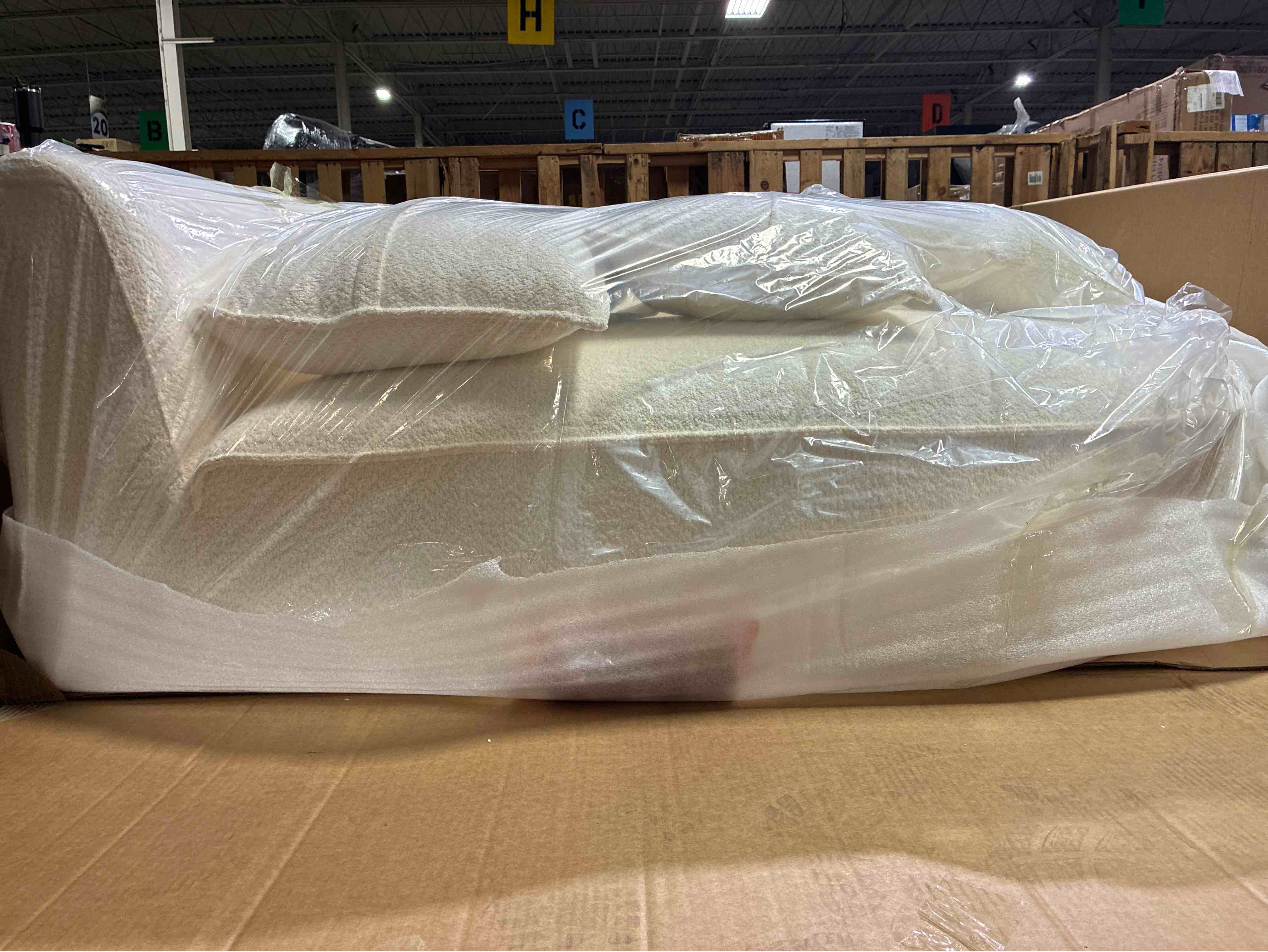 Condition photo showing New/Like New for White Boucle Curved Lounger with Pillows, 60” L x 48” D x 24” H