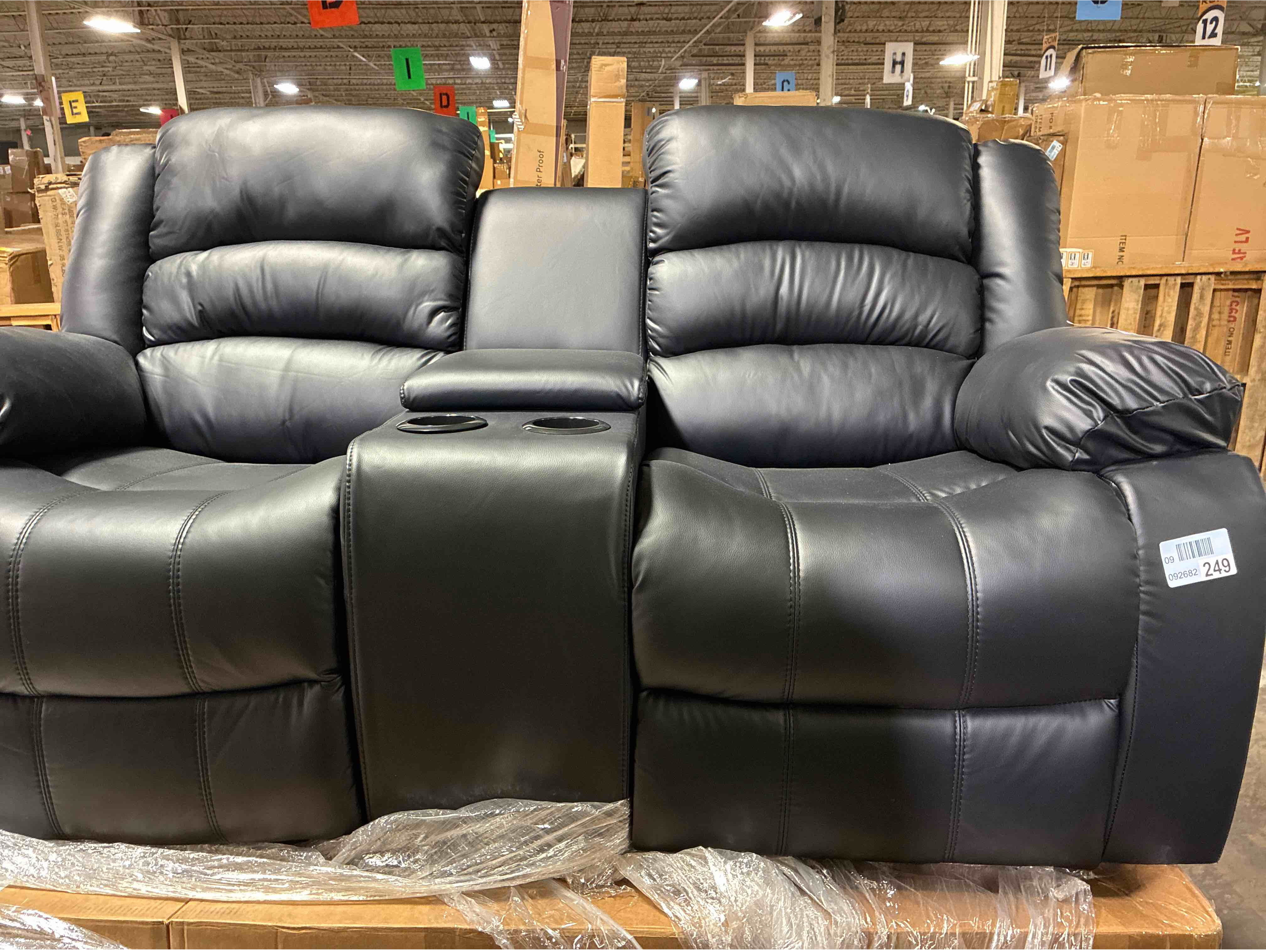 Condition photo showing New/Like New for Emryn 71.7'' Wide Modern and Overstuffed Breathable Vegan Leather Manual Reclining Loveseat Sofa with Cup Holders and Storage Console. 39.8'' H X 71.7'' W X 35.4'' D