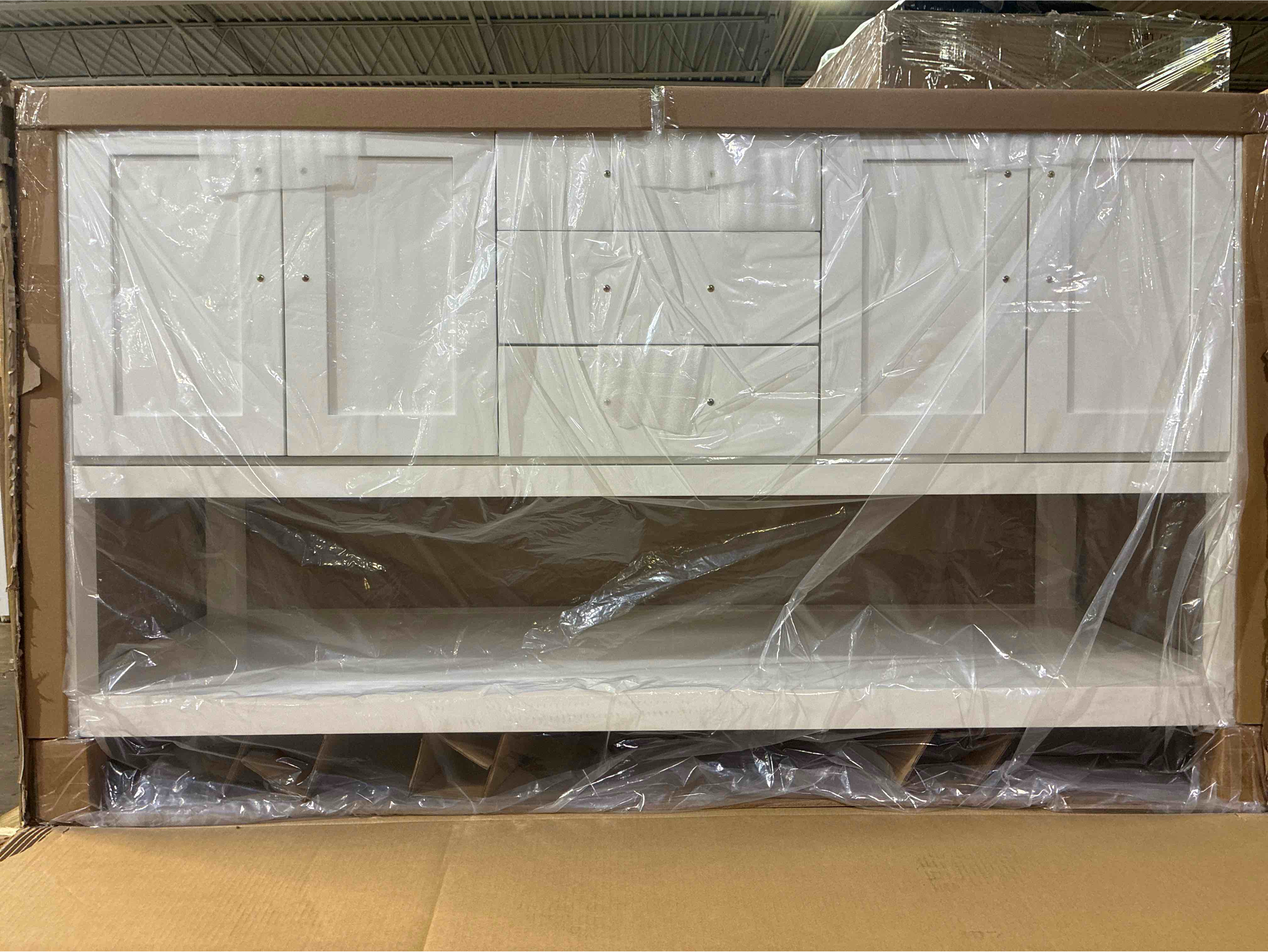 Condition photo showing New/Like New for ARIEL Magnolia 60” White Double Sink Bathroom Vanity with 2 Open Space Cabinets, 3 Drawers, Open Base Shelf, and Brushed Nickel Hardware. Sink top sold separately can be purchased in various styles through Ariel Bath.