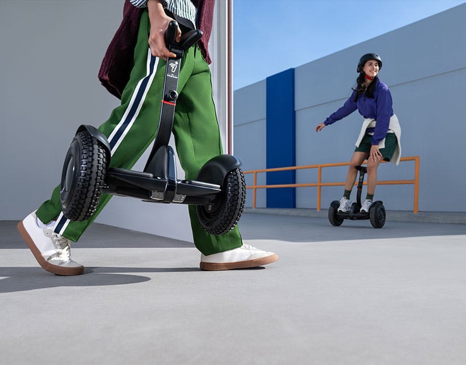 Condition photo showing Good Condition for Segway Ninebot S2 Self-Balancing Scooter, Weight Capacity 220lbs,  Charge Time 4.5 Hours, Top Speed 11.2 mph, Up To 21.7 Miles On A Single Charge, Adjustable knee control bar, Bluetooth speaker, and customizable RGB Lights, Charger Needs Replaced, Can be Purchased online ($20-$60) 