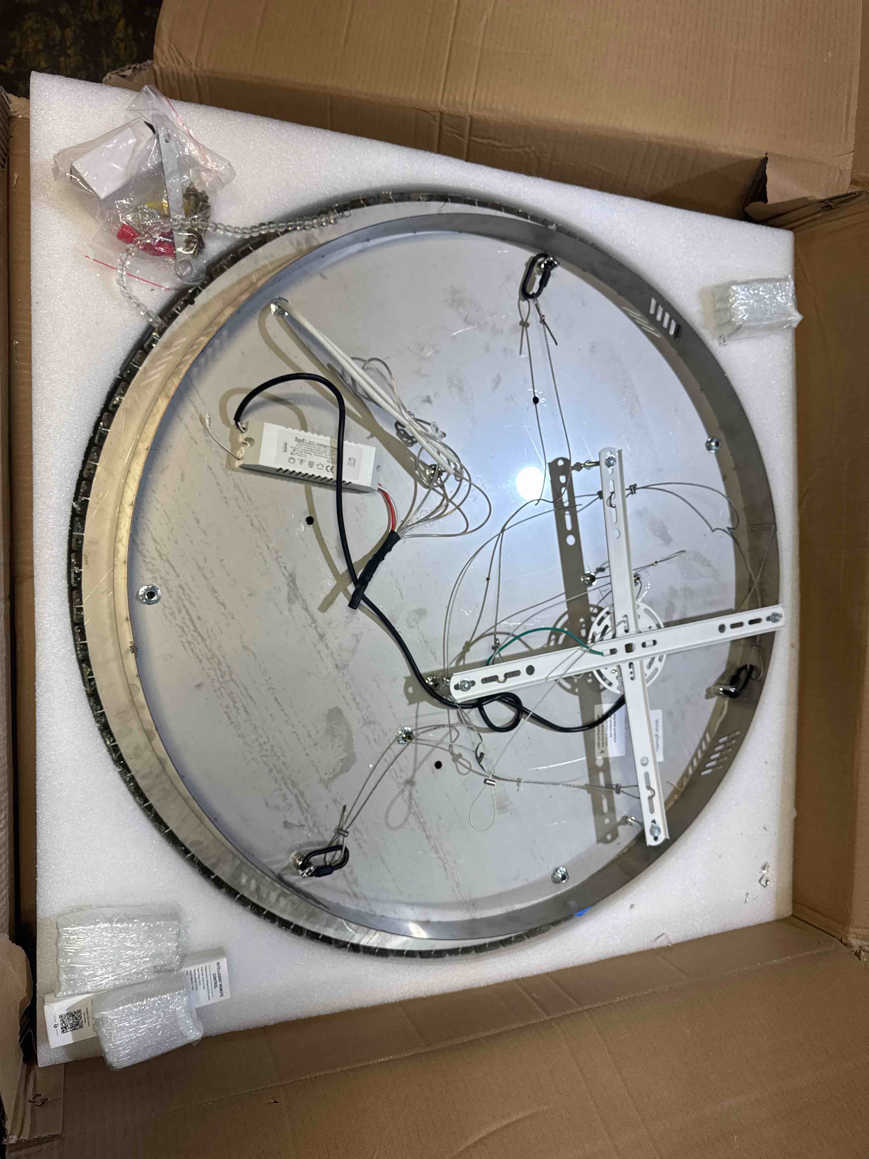 Condition photo showing New/Like New for D32 Inch Ceiling Mounted Modern Large Ring Silver Crystal Raindrop Chandelier, LED 3000-6000K Infinity Dimmable. Needs several crystals replaced, replacement crystals already provided. 