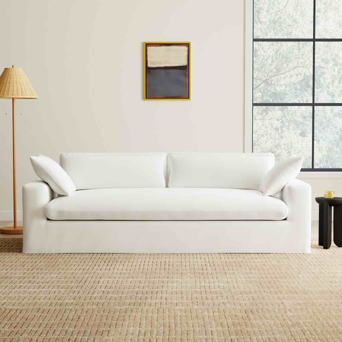 Condition photo showing New/Like New for remy 90" slipcovered sofa with cushions and four pillows (slipcover needs washed) 34.5'' h x 90'' w x 42'' d