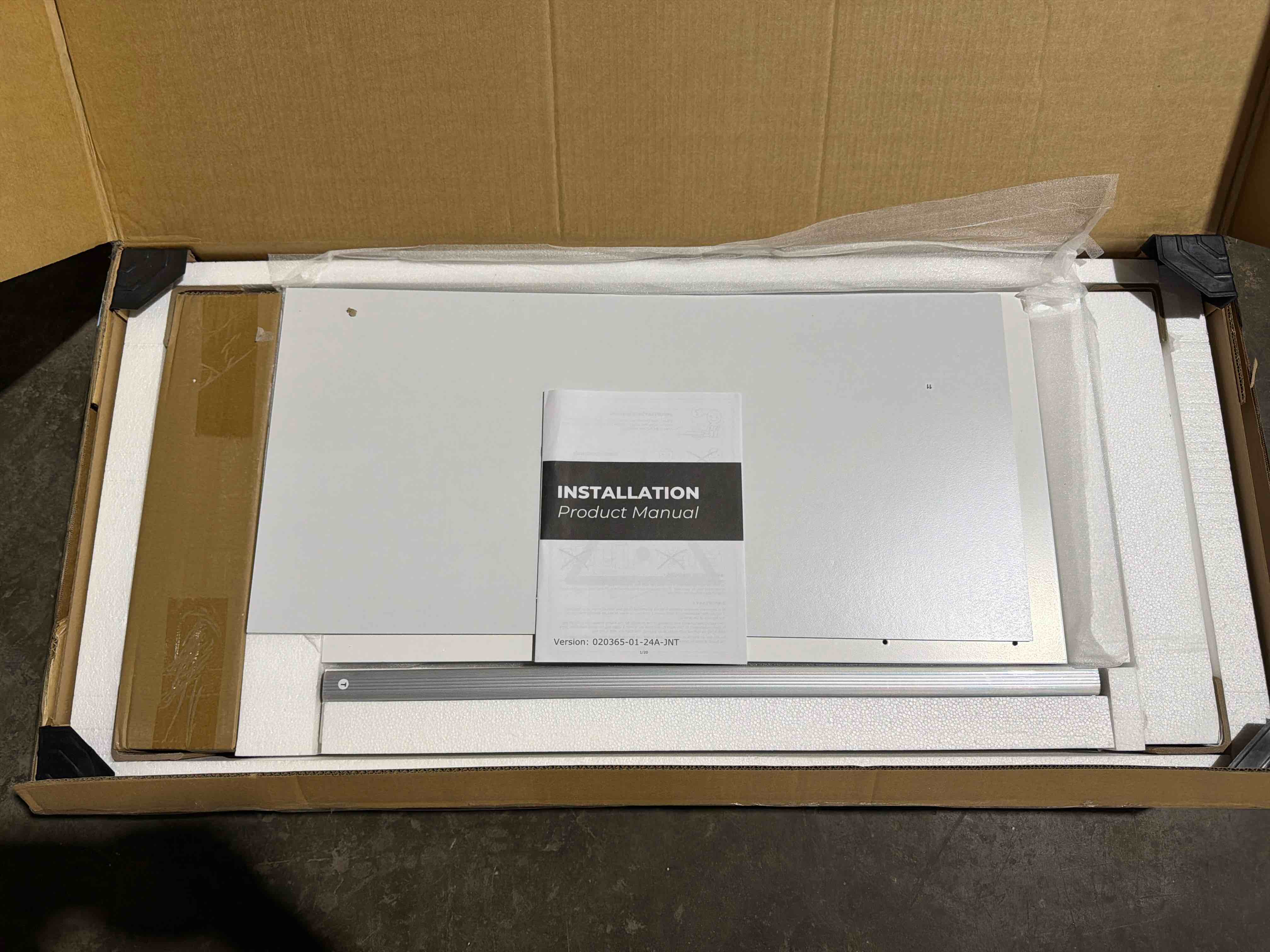 Condition photo showing New/Like New for milen armoire in white with gold finished hardware, 16 hinged doors, 4 integrated clothing rods, multiple interior shelves, solid and engineered wood construction, overall dimensions 74.8'' h x 126.8'' w x 19.3'' d, (2 boxes total)
