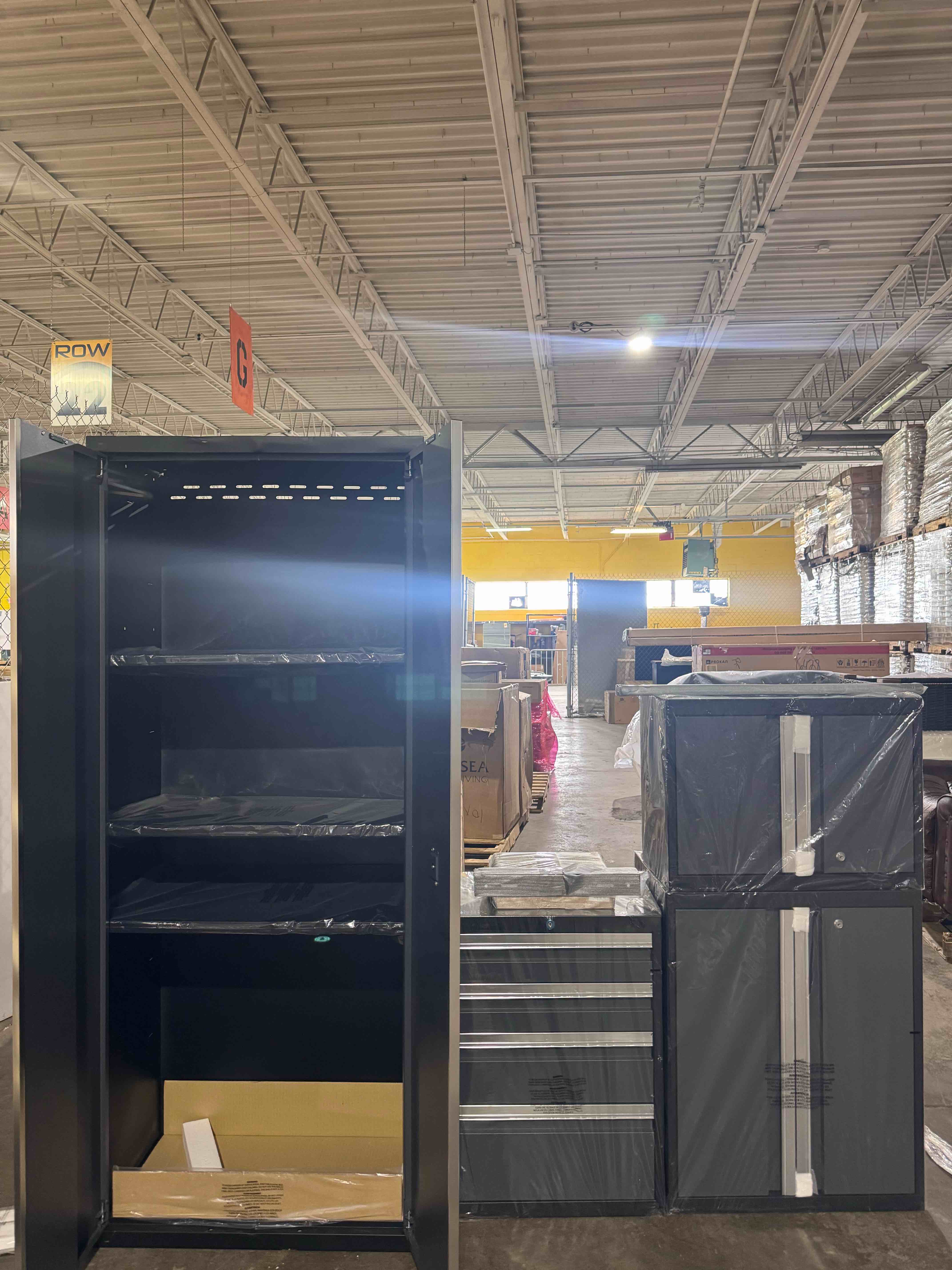 Condition photo showing Good Condition for 4 piece garage storage solutions (locker has dents on back/top, and minor scuffing on left side—all pictured) see lot photos for exact item