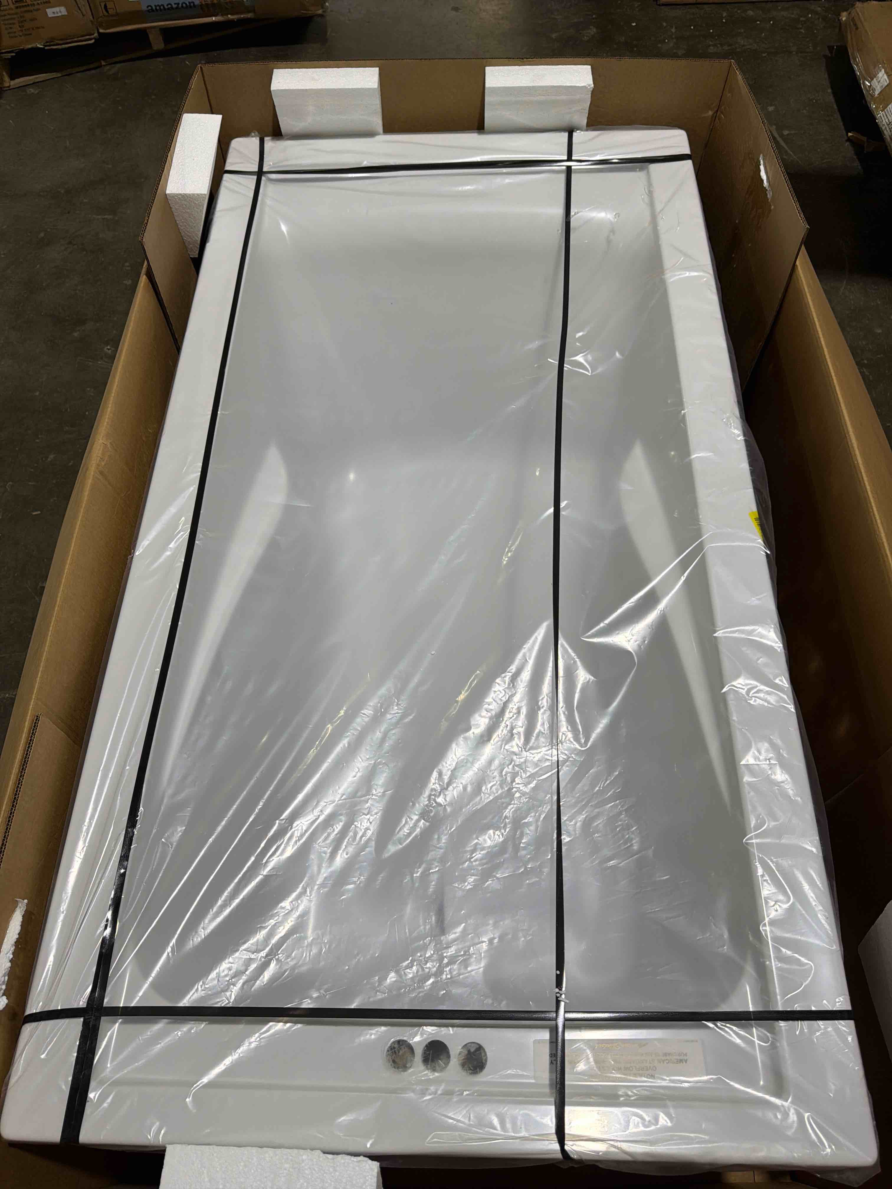Condition photo showing New/Like New for american standard evolution 5 ft. x 32 in. deep soaking tub with reversible drain, white, 60 or more gal