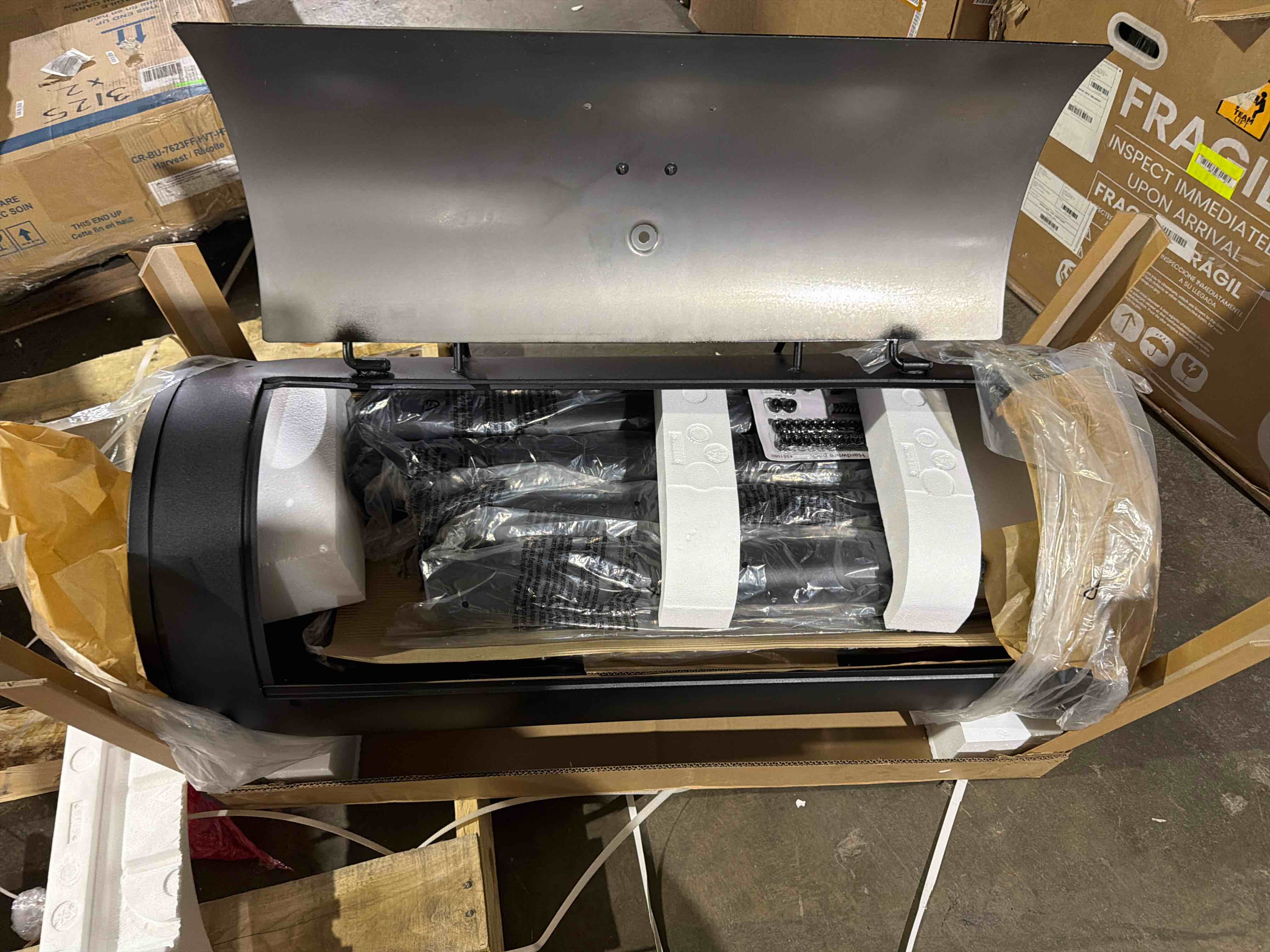 Condition photo showing New/Like New for 1012 sq. in. black competition pro™ offset smoker charcoal grill, sidefire box included, side damper for precise temperature control, explanded metal cooking grates, 10” wheels and end handle for easy mobility