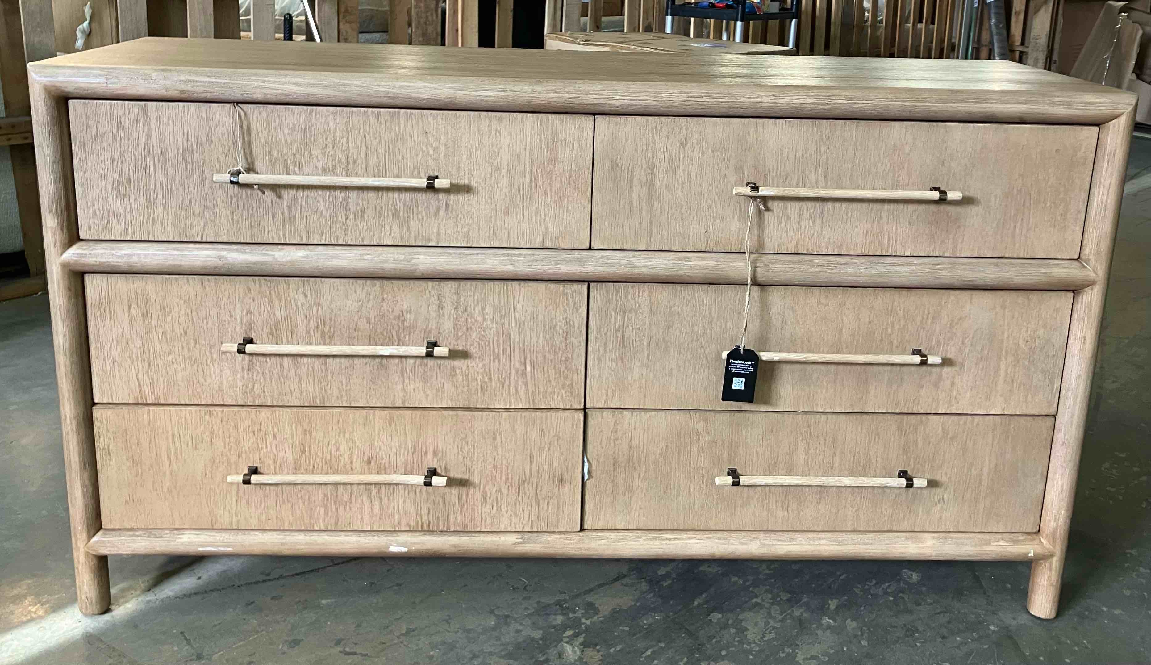 Condition photo showing Good Condition for 66” colleen 6 drawer dresser by birch lane - (good condition because middle support leg has been broken off of bottom, not visible and can be repaired. also one handle is broken and some handles are scratched, pictured)
