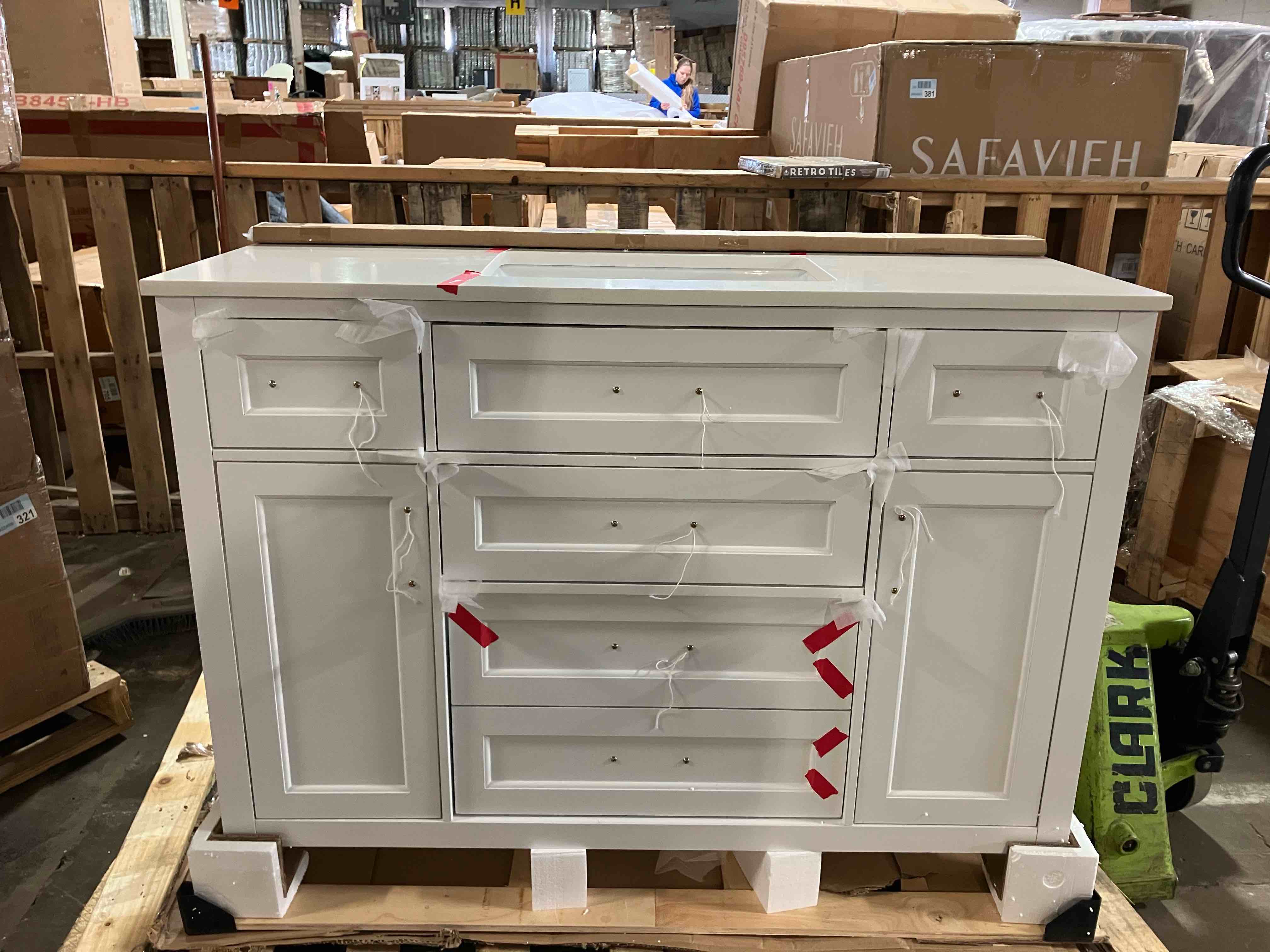Condition photo showing Good Condition for tahoe 48 in. single sink white bath vanity with carrara marble top (assembled) - (good condition because of 3 cracks on vanity top, and a crack on the upper rear board, both pictured)