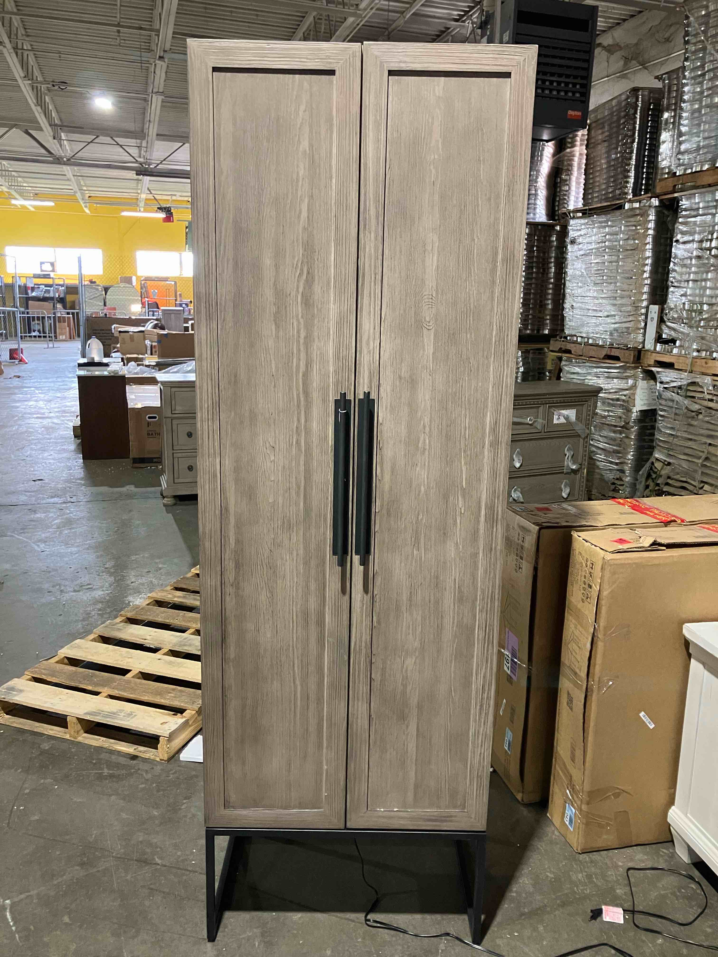 Condition photo showing New/Like New for baxley solid wood armoire by birch lane - (item is new/like new, but it is noted that the upper rear right corner has some scraping, as well as the left side top edge)