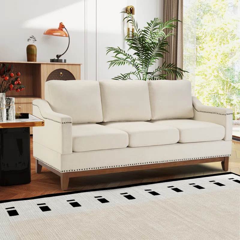 Idrissi 70" W Beige Square Arm Classic 3-Seater Sofa With Nailhead Silver Button Tufted Trim, Almond Finished Wooden Base, and Cotton Blend Beige Upholstery. 34.75'' H X 70.08'' W X 30.5'' D