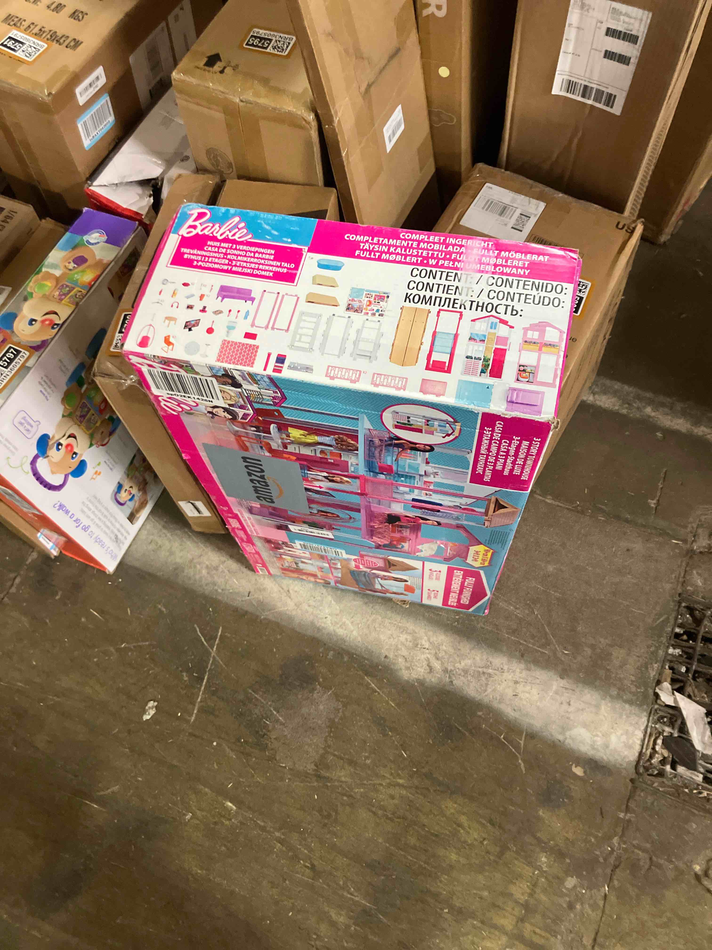 Condition photo showing New/Like New for Barbie 3-Story Townhouse Dollhouse with Elevator, Swing Chair, Furniture and Accessories, Fold for Portability and Travel (Amazon Exclusive)