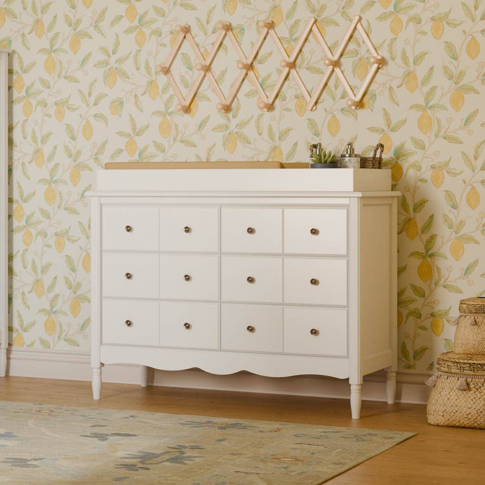 Liberty 6-Drawer Dresser in Warm White with Antique Brass Knobs. Some scratching on backboard, otherwise brand new. 48"L x 18.75"W x 34.25"H
