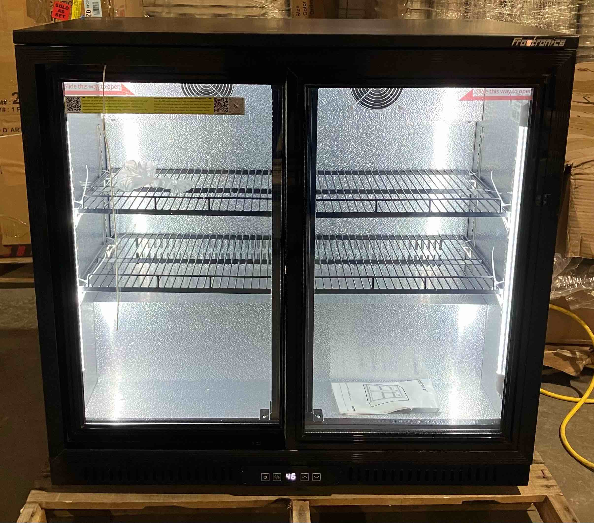 Condition photo showing Good Condition for Frostronics 36 Inch 228 Cans Double Door Back Bar Beverage Cooler, 6.5 cu. ft. Under Counter Glass Bar Fridge With Sliding Door, Lockable, 32-50F Display Refrigerator, ETL & NSF7 Certified - (Good condition because of 2 small dents on back right corner, and some scratches on sides and top)