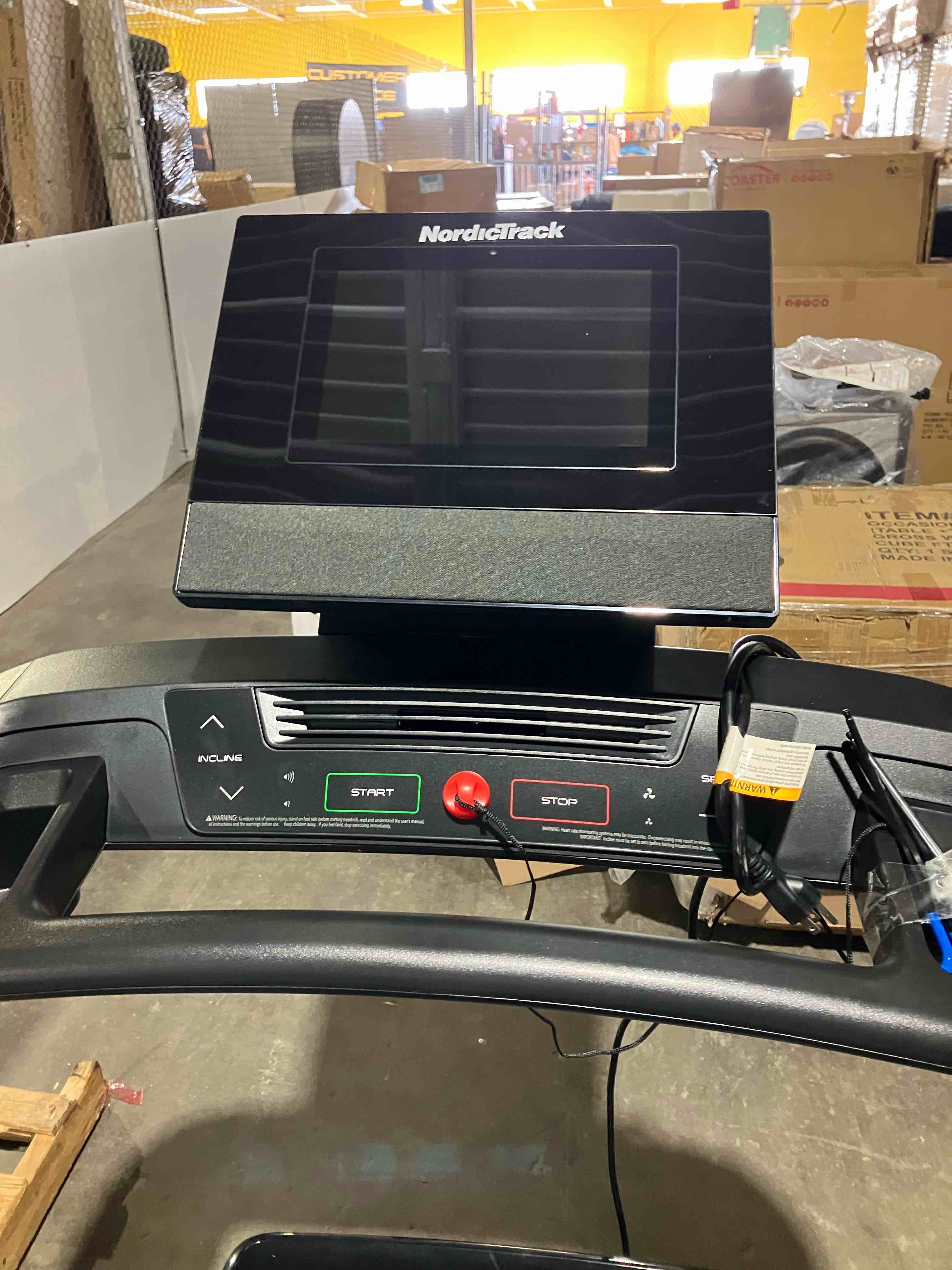 Condition photo showing As Is for NordicTrack T Series 10 Treadmill in Black - (As is condition because during the testing of this product we could not get it to power on, it will need some repair to work. Also has some scratches and gouges in the plastic on sides)