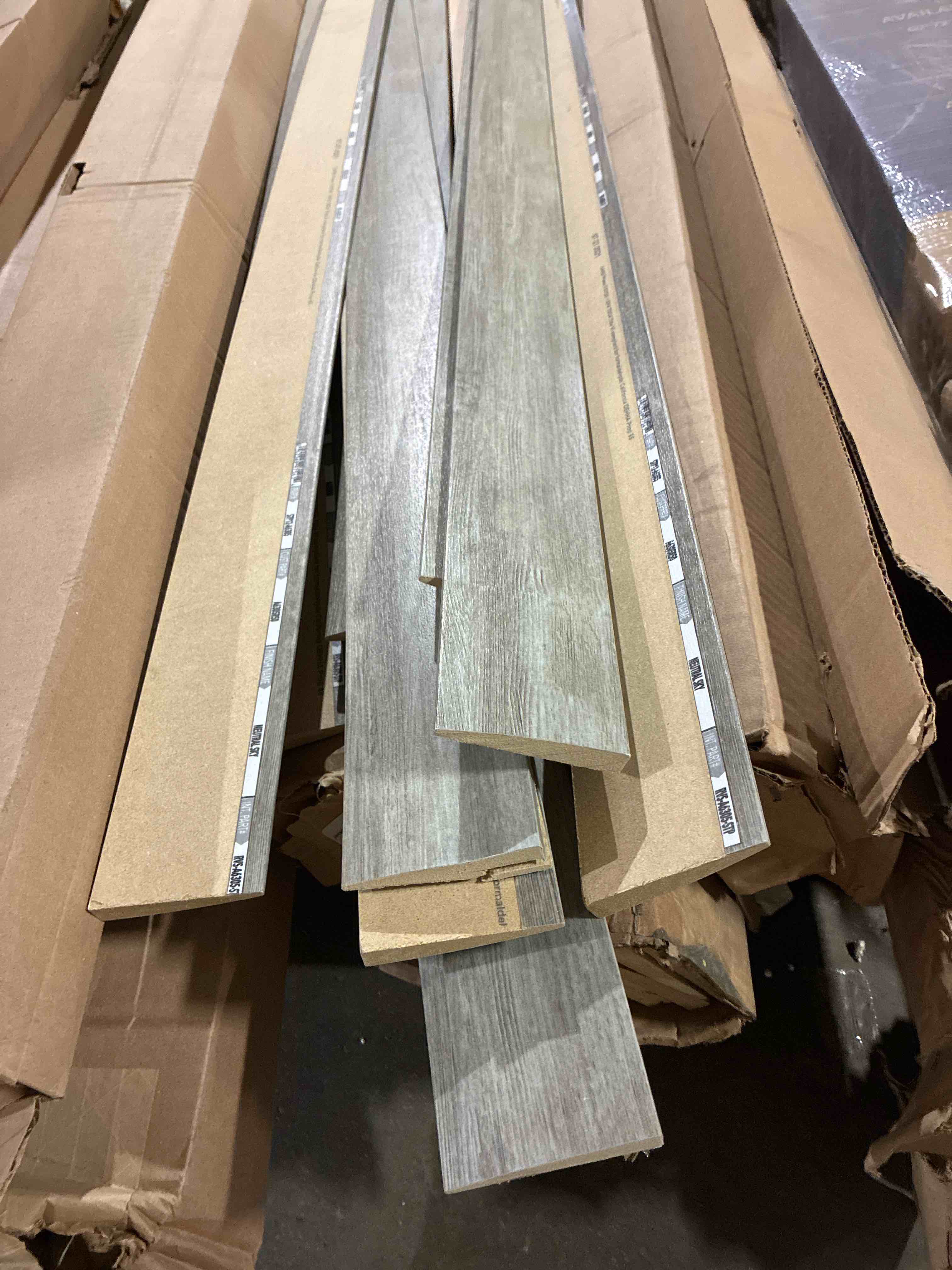 Condition photo showing Good Condition for Armstrong Wooden Base Trim Pallet Featuring Peppercorn Brown and Neutral Sky Grey, Variety Wood 94” L x 3 W x .5 Thick