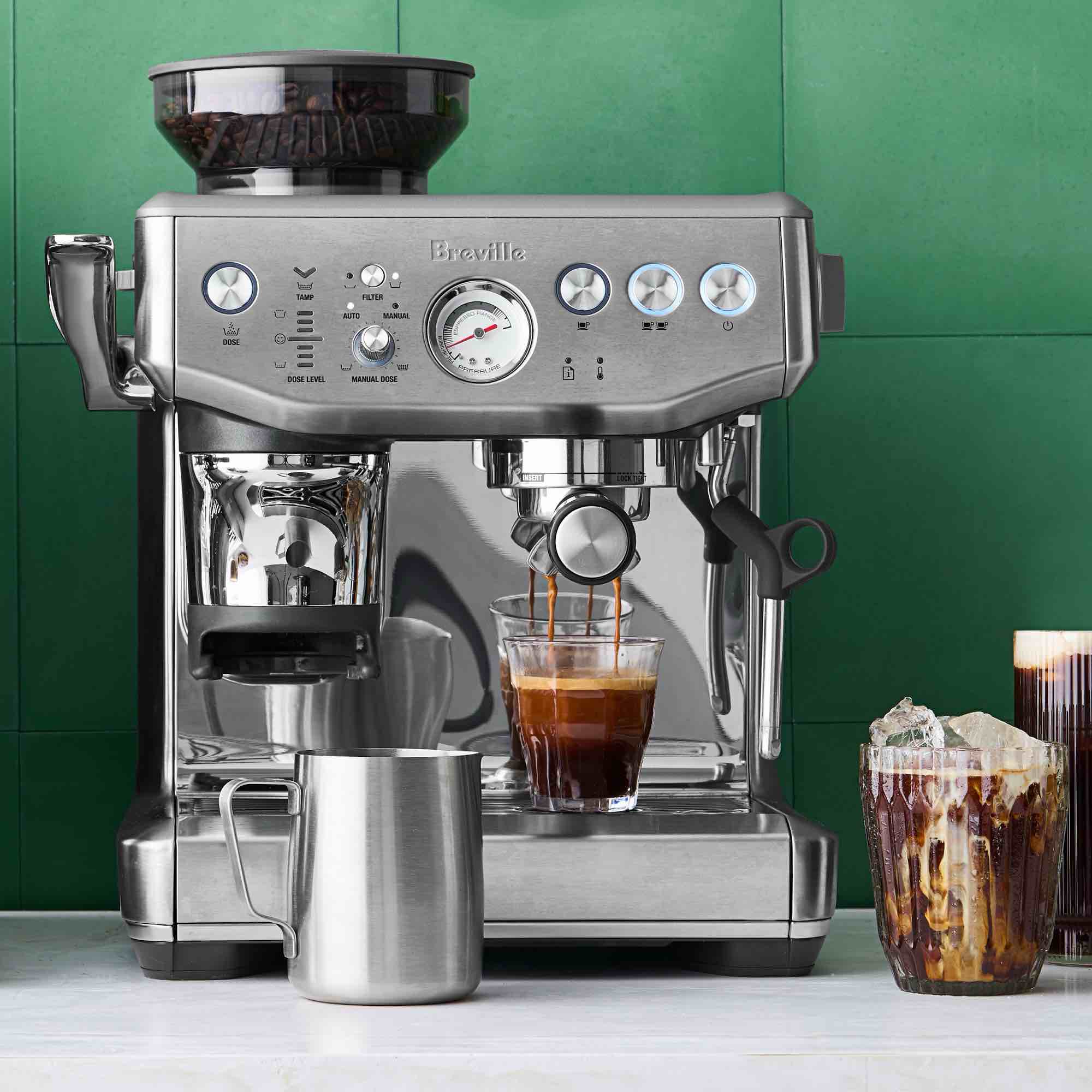 breville barista express® impress espresso machine, missing a single and double basket (one of each included), ground cup, and steamer cup. all available through william sonoma or breville (machine cannot be used without ground cup) 13" x 15" x 16"